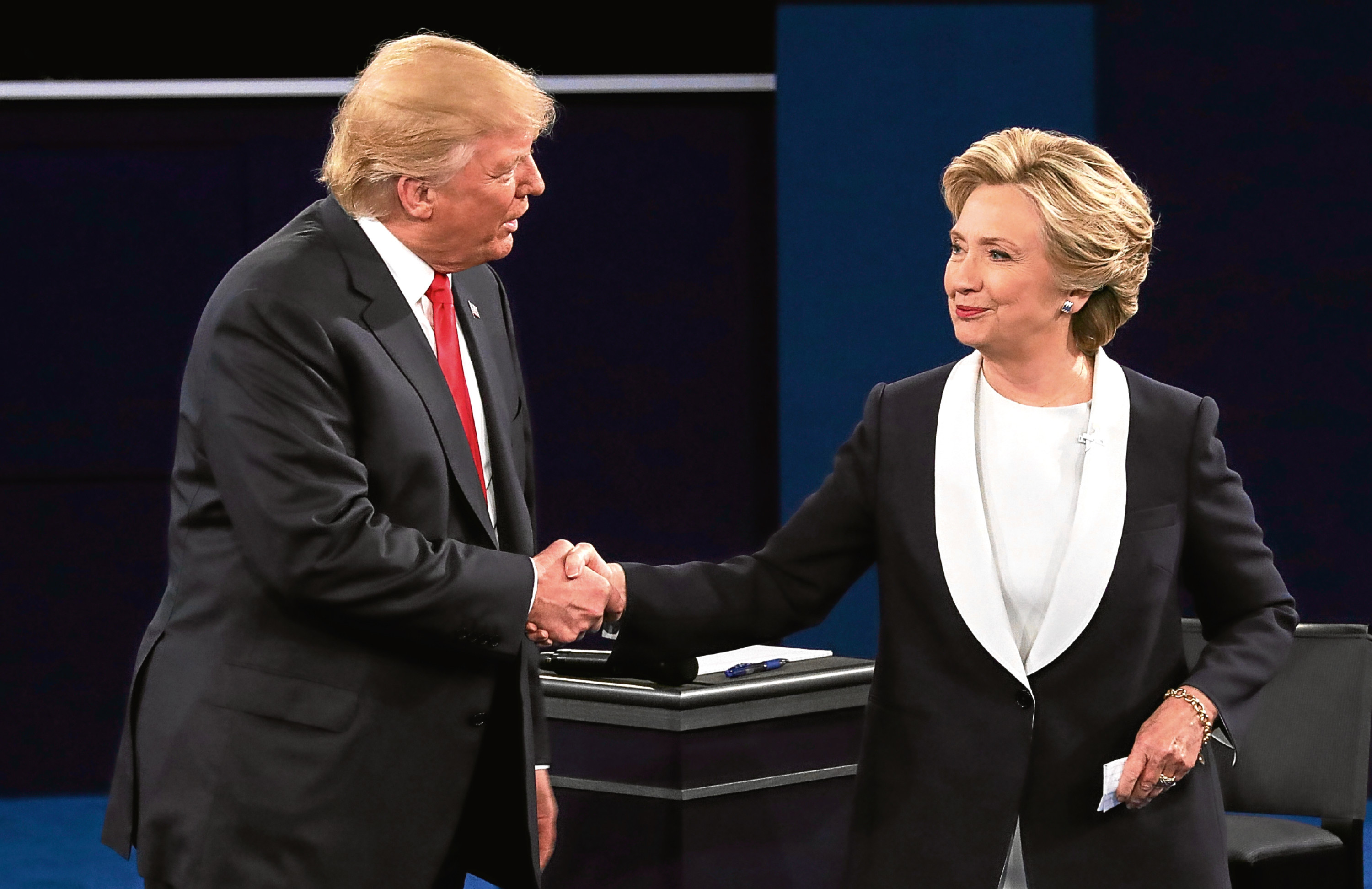 Donald Trump shakes hands with Hillary Clinton (Chip Somodevilla/Getty Images)
