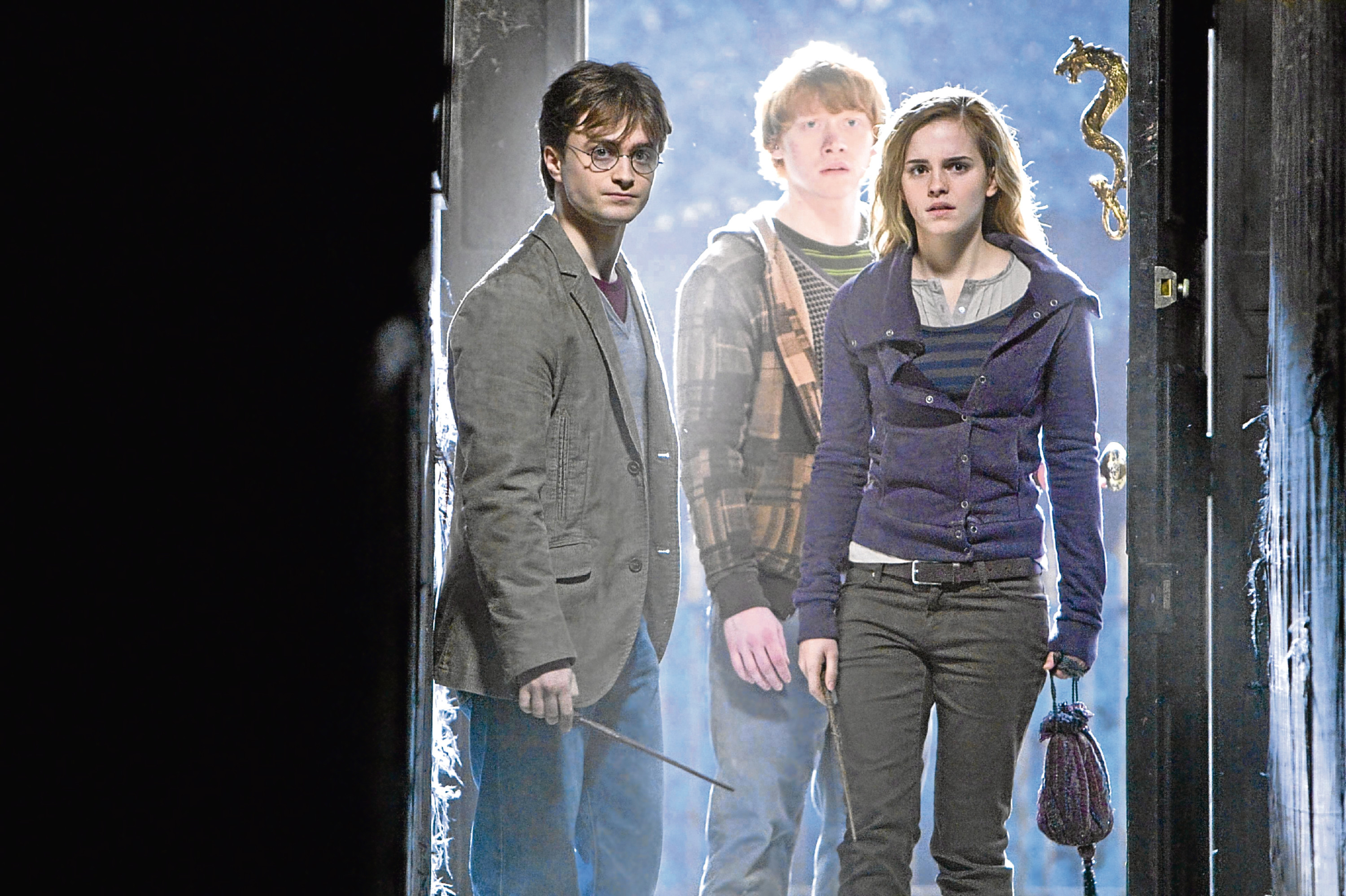 Daniel Radcliffe as Harry Potter, Rupert Grint as Ron Weasley and Emma Watson as Hermione Granger (PA Photo/Warner Bros)