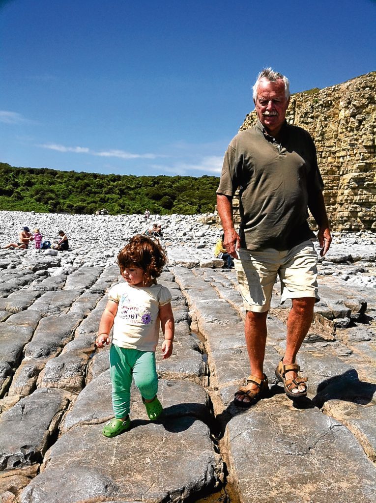 Brian and his granddaughter at Llanilltud Fawr, on the Wales Coast Path, in 2012, not long before he died.