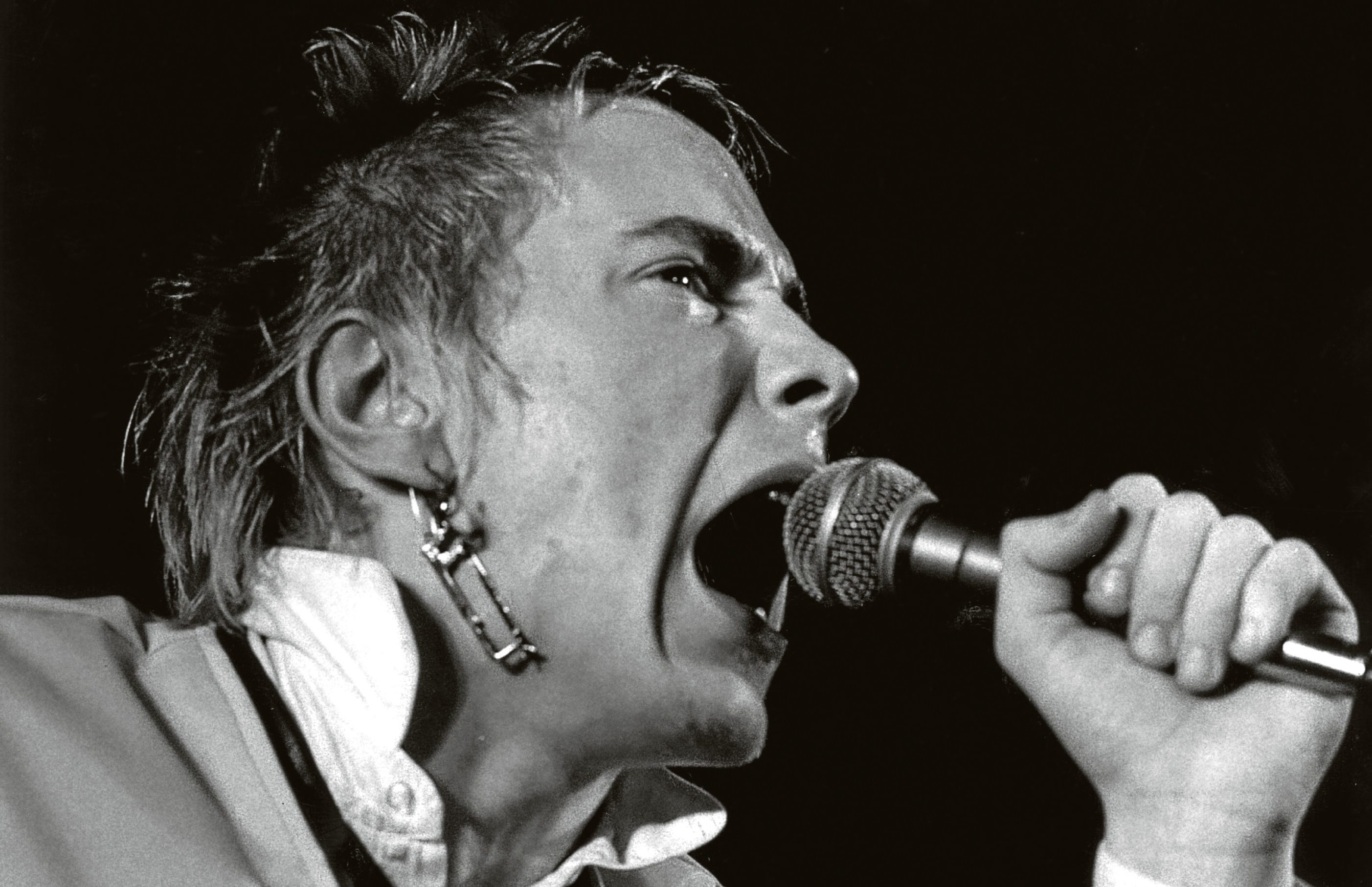 Johnny Rotten of the Sex Pistols performing.  (Graham Wood/Evening Standard/Getty Images)