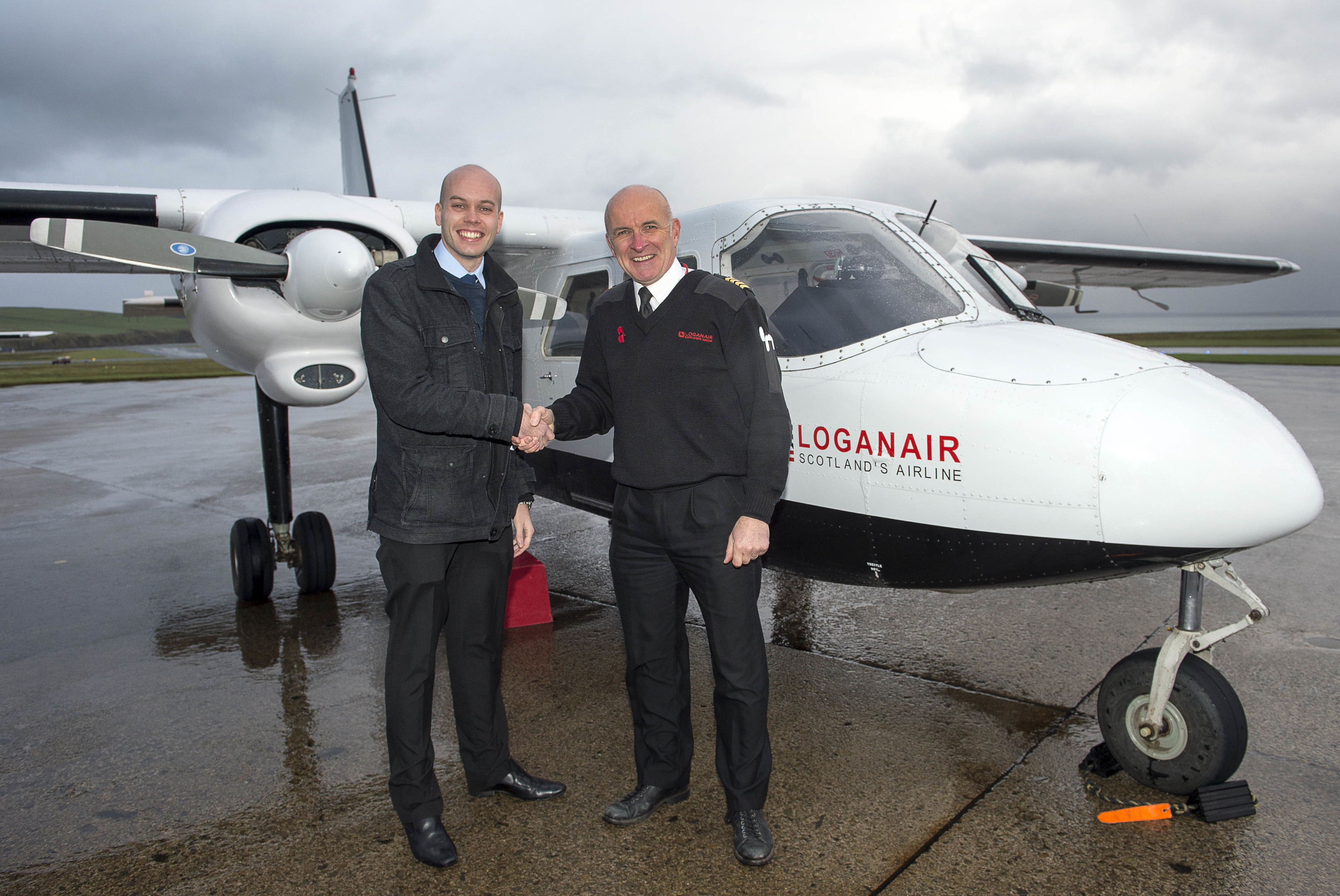 World's Shortest Flight Westray to Papa Westray-
Sunday Post reporter Stuart Findlay and Capt Colin McAllister (Trevor Martin)