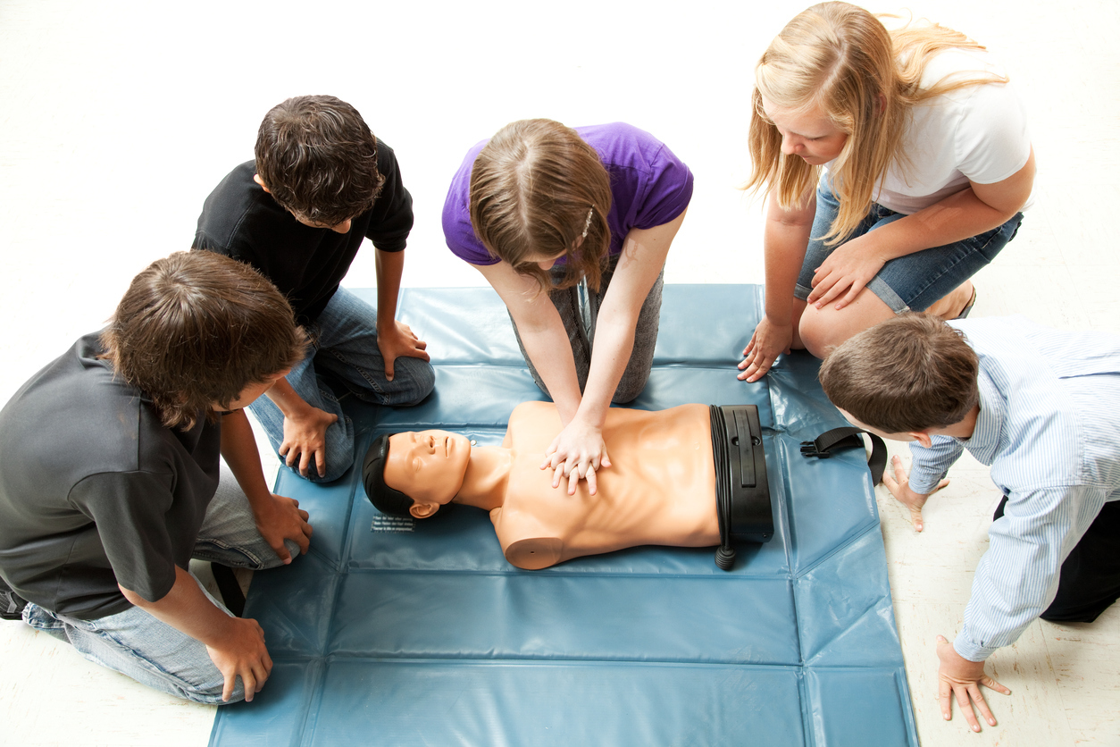 Children learning how to perform first aid (Getty)