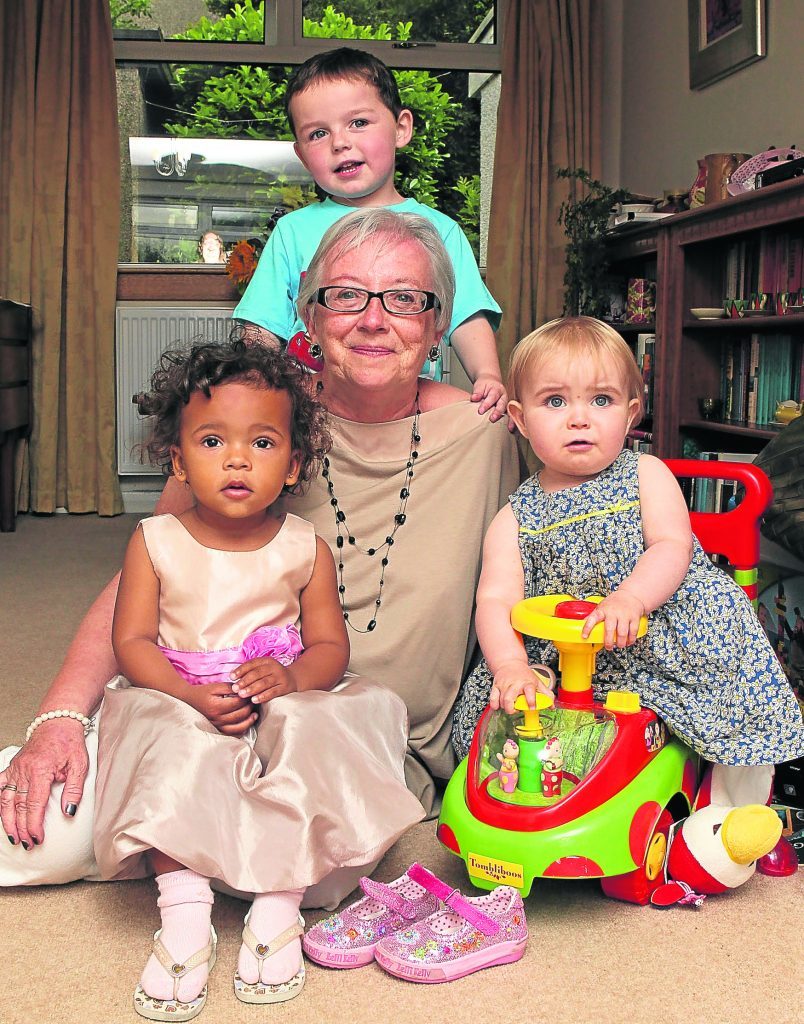 Sunday Post columnist Margaret Clayton with 3 of her grandchildren, Jamila, Jack and Emily.