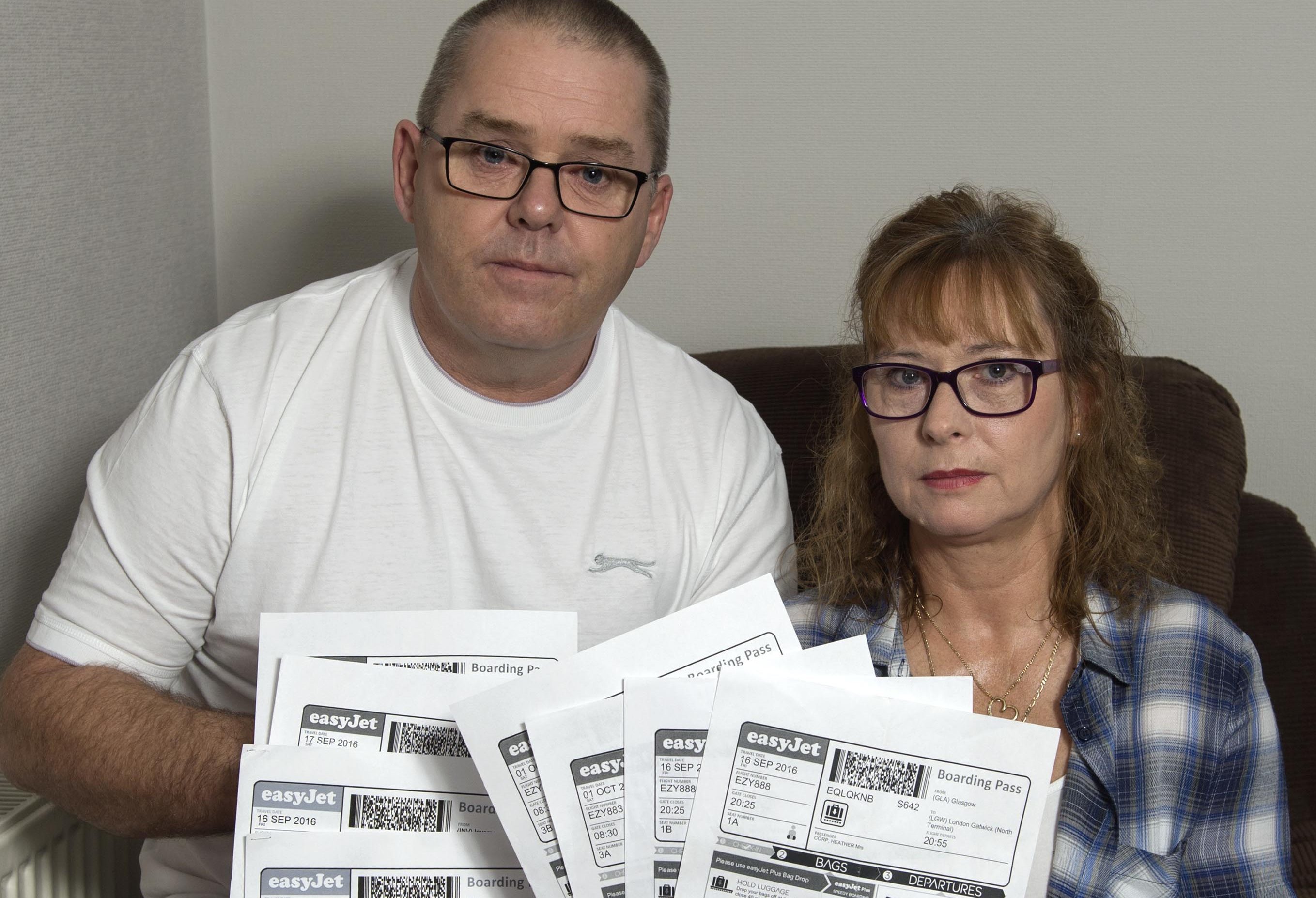 Martin and Heather Corp with their 14 EasyJet Boarding Passes (Trevor Martin)