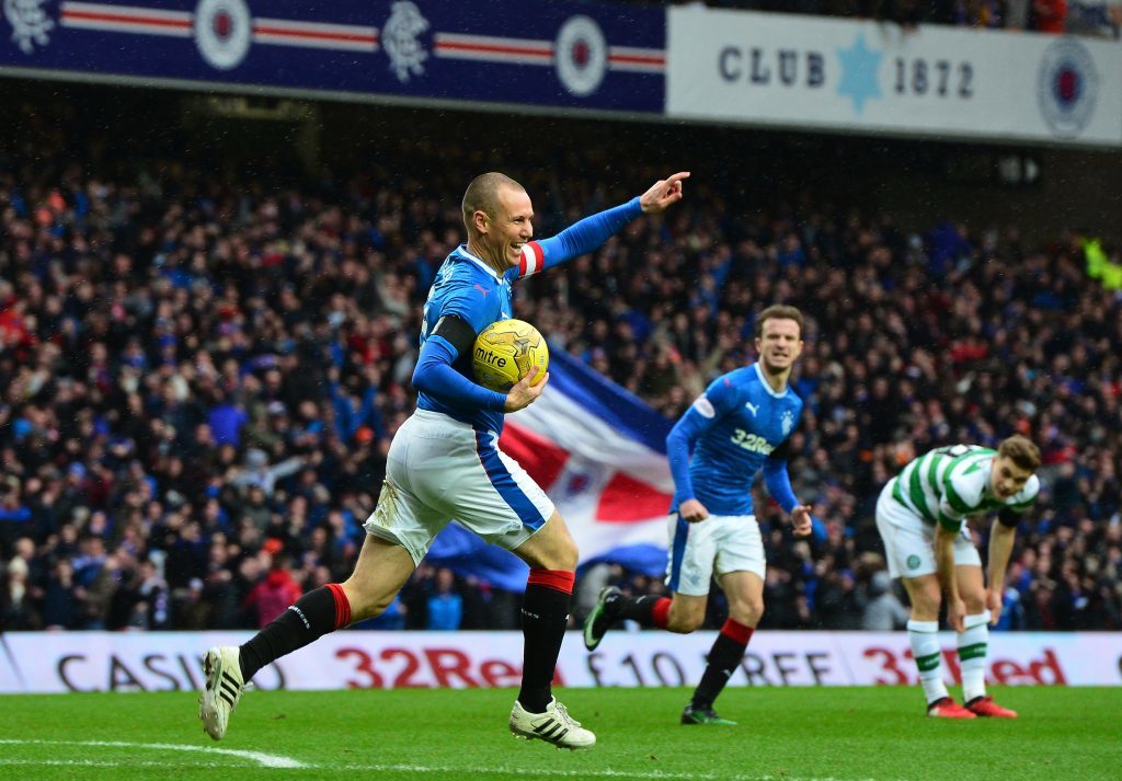Kenny Miller celebrates the opener (Mark Runnacles/Getty Images)