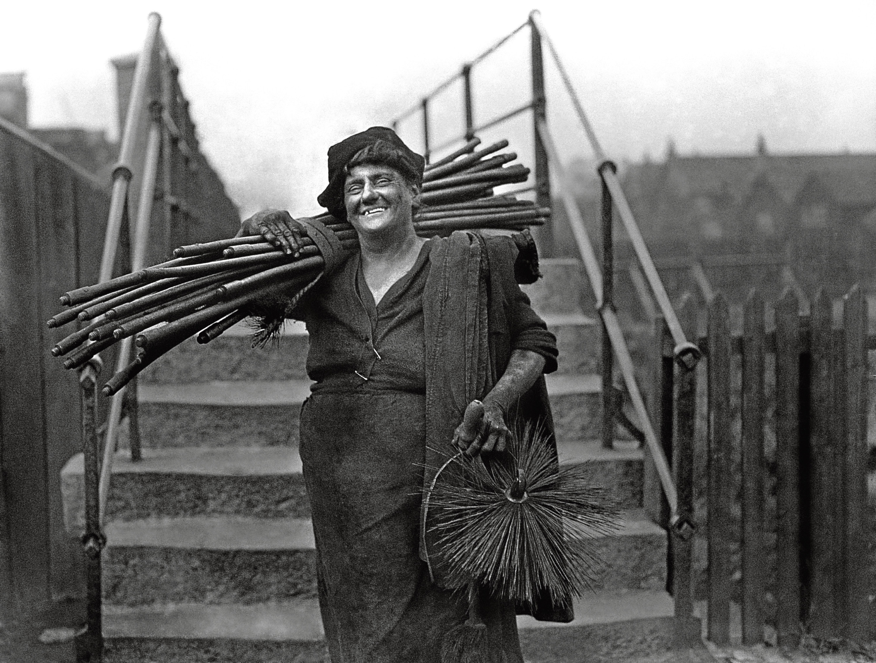 Former stage star May Nelson poses for a photographer after taking on her husbands occupation as a chimney sweep.