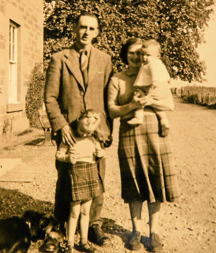 Bill with parents and sister