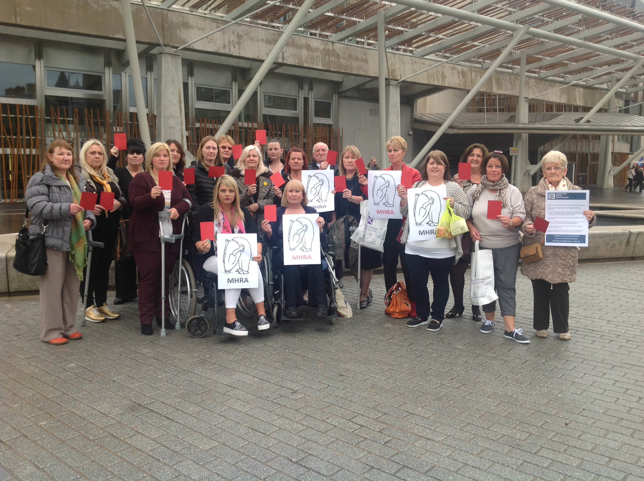 A group of campaigners lobbying against the use of mesh in surgical operations at the Scottish Parliament