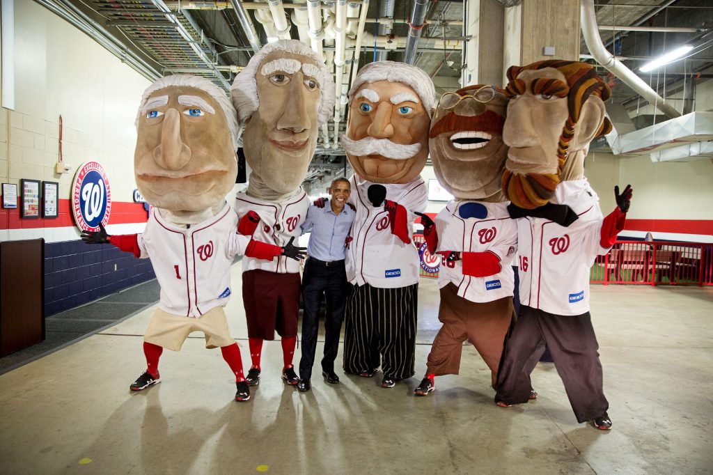 June 11, 2015 “We had just stopped by the annual Congressional Baseball Game at Nationals Park and we were already driving away underneath the stadium. The President asked the Secret Service to stop the motorcade when he spotted The Racing Presidents (they compete against each other in a running race during every game). My vehicle was 100 feet ahead so I jumped out and ran back in time to catch them in a group photo for posterity.” (Official White House Photo by Pete Souza)