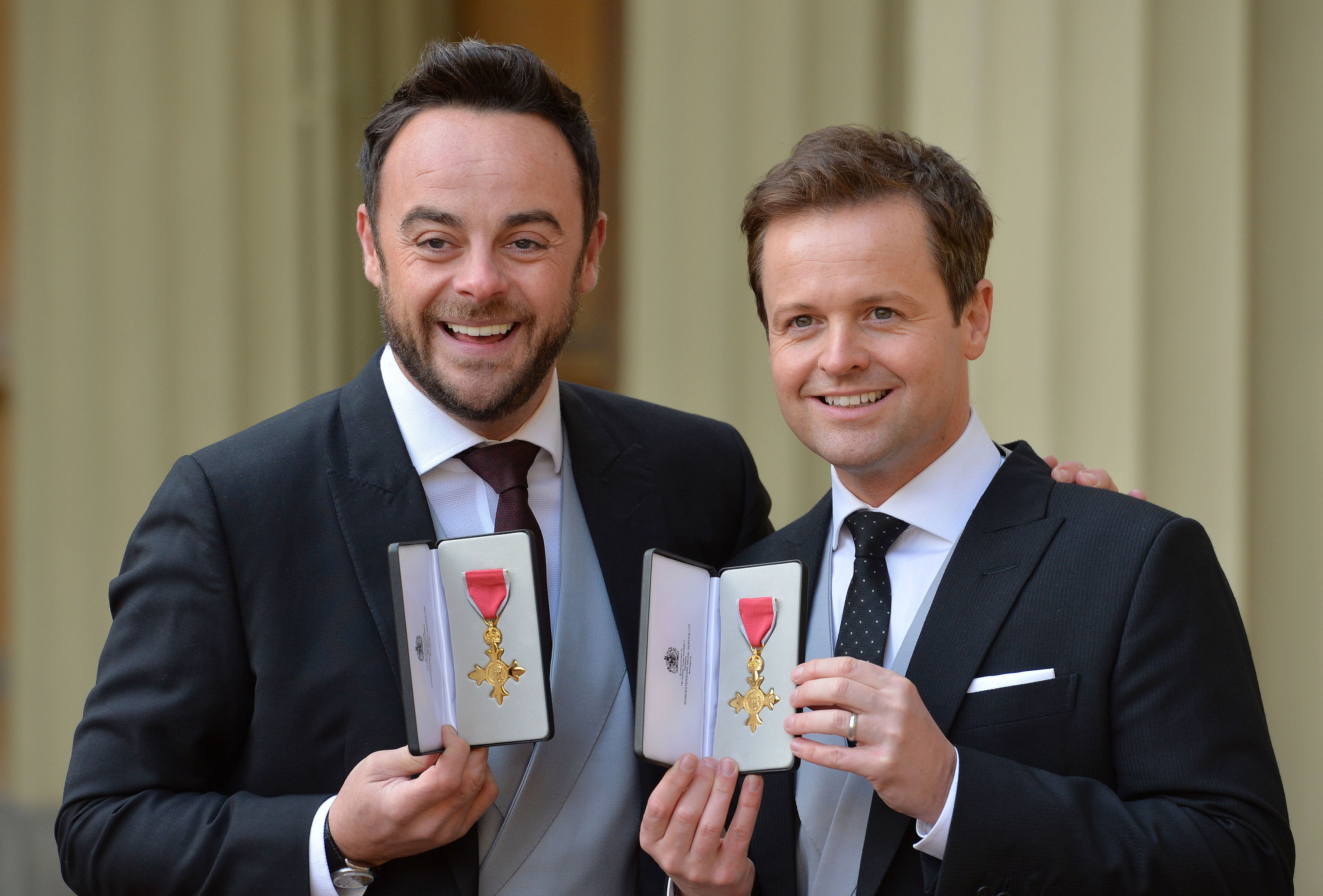 TV presenters Ant and Dec after they were presented with OBEs by the Prince of Wales (PA)