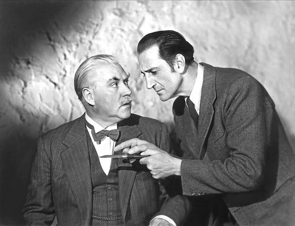 Nigel Bruce and Basil Rathbone in Sherlock Holmes and The Scarlet Claw, 1944 (Allstar/UNIVERSAL PICTURES) 