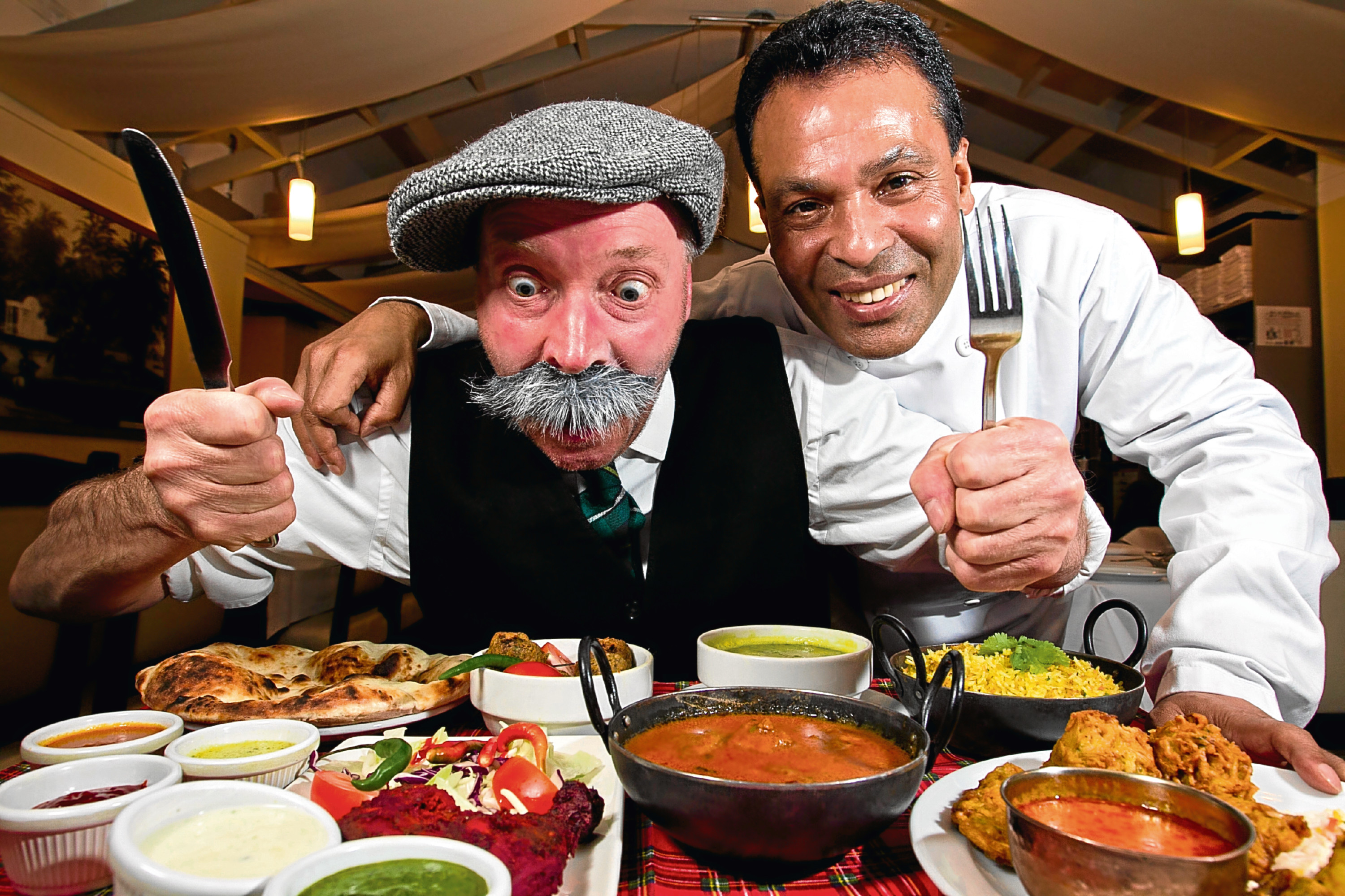 Paw Broon (Gordon Campbell) and Tommy Miah, owner of The Raj restaurant (Andrew Cawley / DC Thomson)