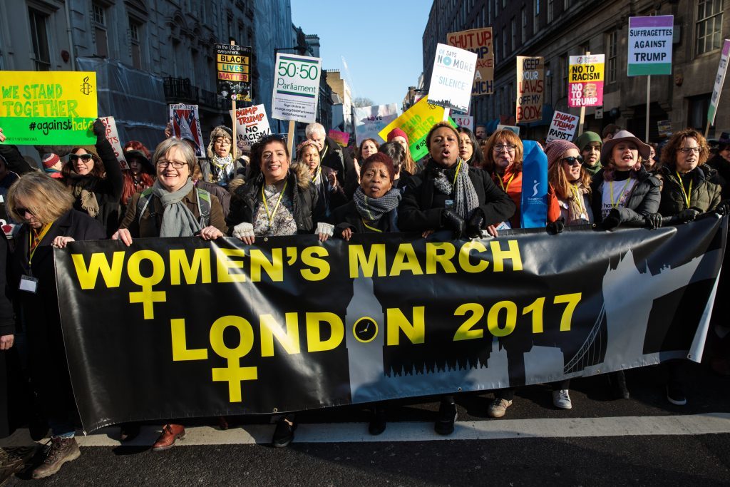 LONDON, ENGLAND - JANUARY 21: Protesters march from The US Embassy in Grosvenor Square towards Trafalgar Square during the Women's March on January 21, 2017 in London, England. The women's March originated in Washington DC but soon spread to be a global march calling on all concerned citizens to stand up for equality, diversity and inclusion and for women's rights to be recognised around the world as human rights. Global marches are now being held, on the same day, across seven continents. (Photo by Jack Taylor/Getty Images)