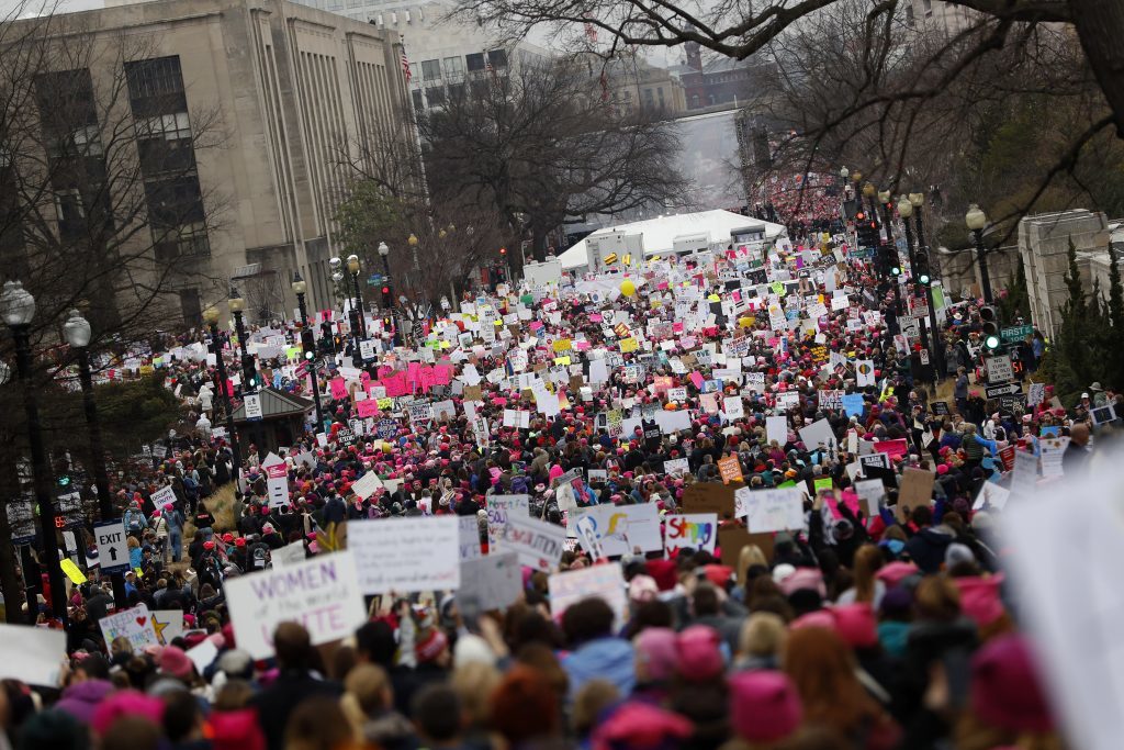 WASHINGTON, DC - JANUARY 21: Protesters gather during the Women's March on Washington January 21, 2017 in Washington, DC. The march is expected to draw thousands from across the country to protest newly inaugurated President Donald Trump. (Photo by Aaron P. Bernstein/Getty Images)