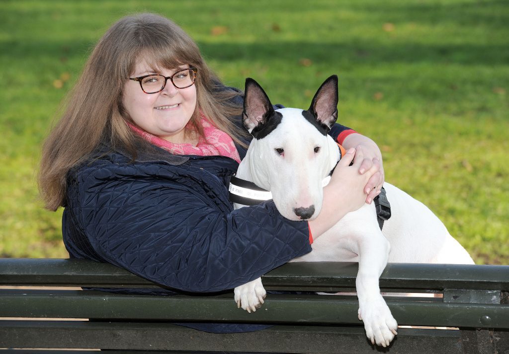 Sally Deegan, 26, from Scunthorpe, Lincolnshire, with her Bull Terrier Bowser (Nick Ansell/PA Wire)