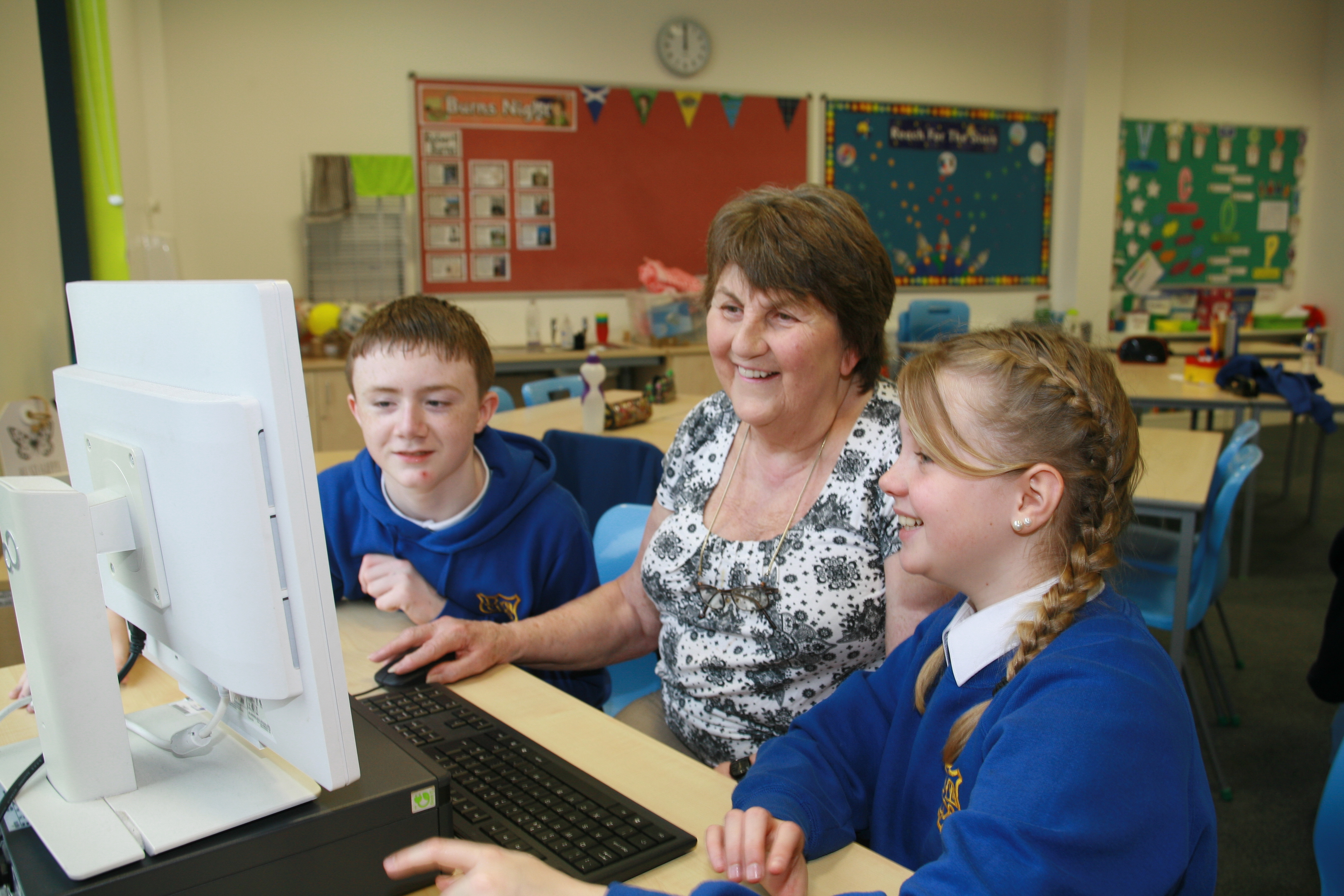 Anne Ferguson gets a helping hand from Aidan Fordham and Faith Easson