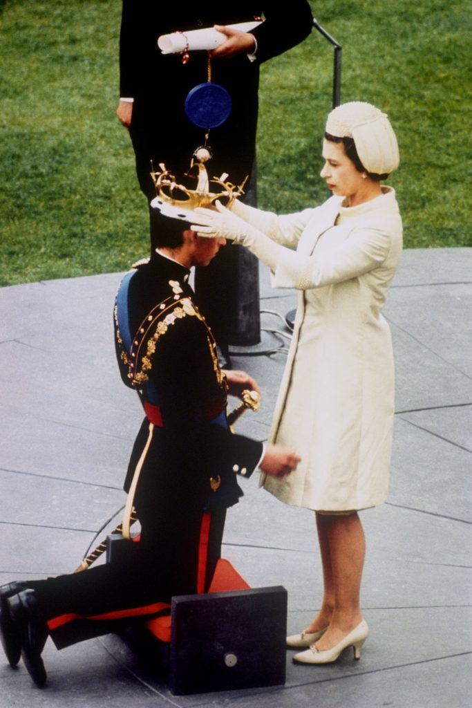 The Queen crowns her son, Prince Charles, as Prince of Wales during the investiture ceremony at Caernarfon castle.