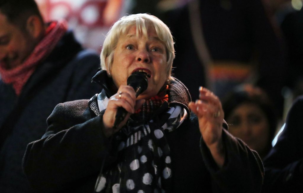 MSP Sandra White addresses demonstrators during a protest in Glasgow against US President Donald Trump's controversial travel ban on refugees and people from seven mainly-Muslim countries. PRESS ASSOCIATION Photo. Picture date: Monday January 30, 2017. Photo credit should read: Andrew Milligan/PA Wire