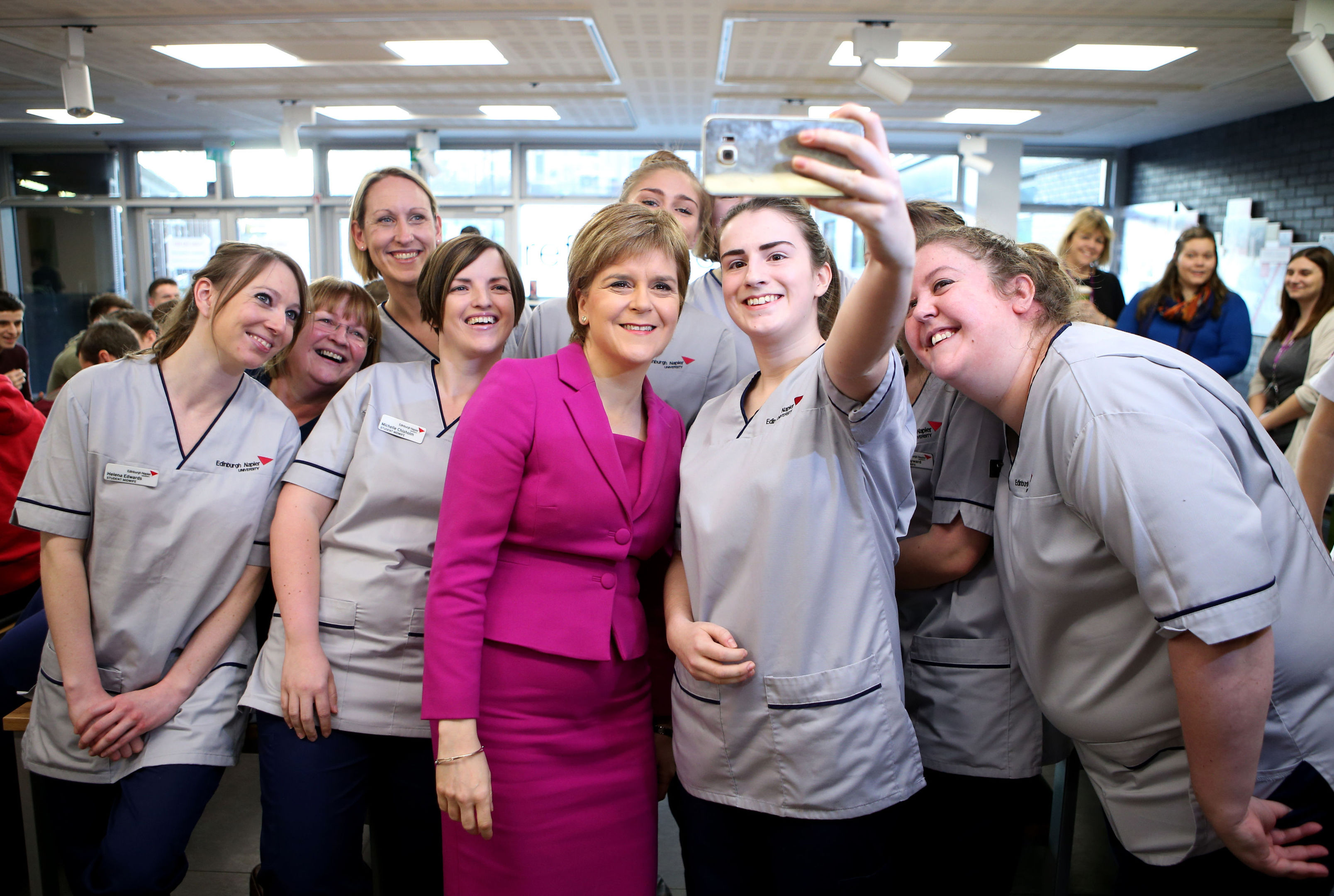 First Minister Nicola Sturgeon poses for a selfie with nursing and midwifery students during a visit to Edinburgh Napier University. (Jane Barlow/PA Wire)