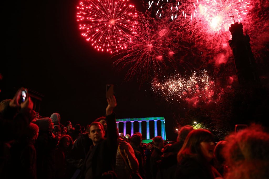Fireworks light up the sky during the Hogmanay New Year celebrations in Edinburgh (Andrew Milligan/PA Wire)