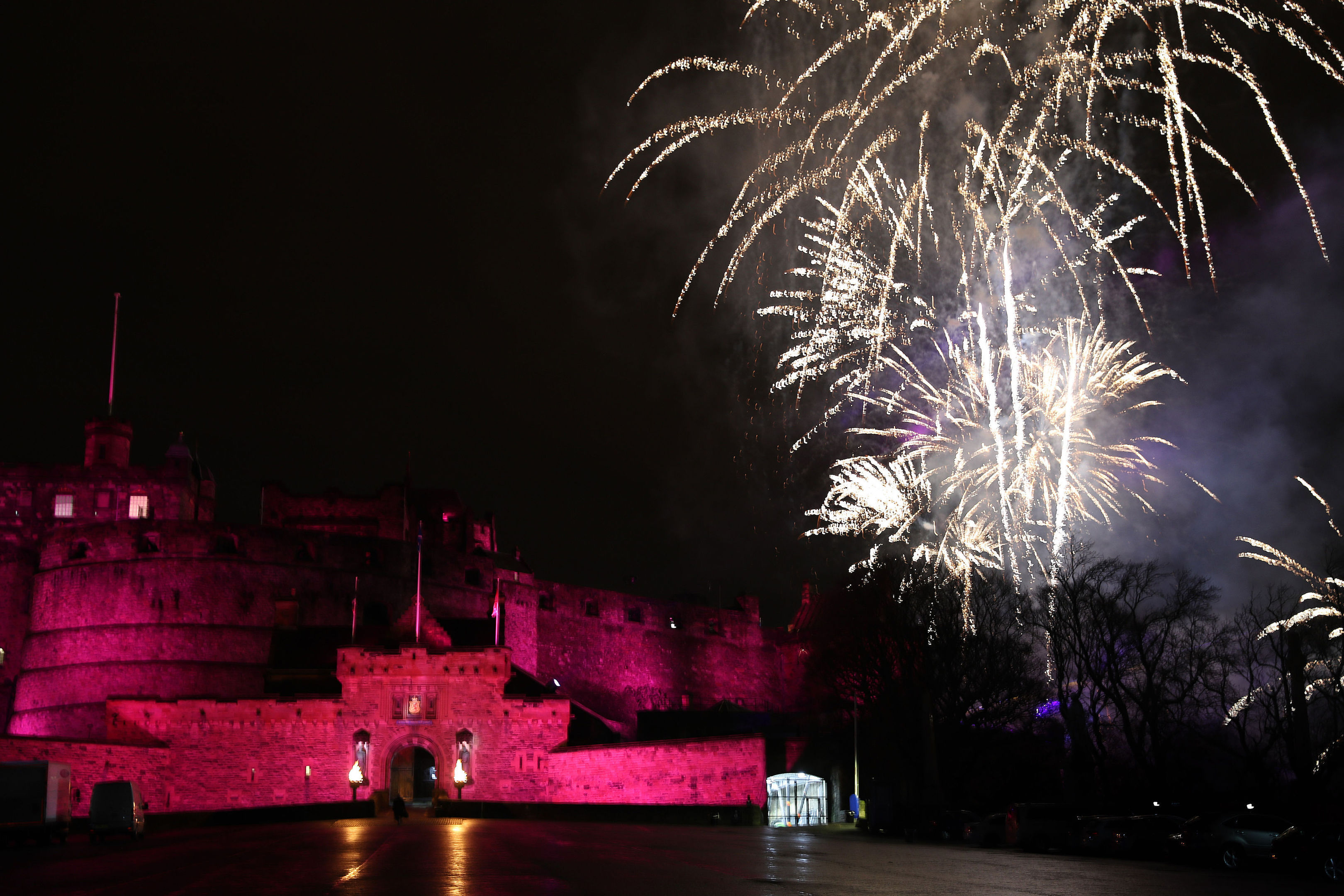 Fireworks light up the sky during the Hogmanay New Year celebrations in Edinburgh (Andrew Milligan/PA Wire)