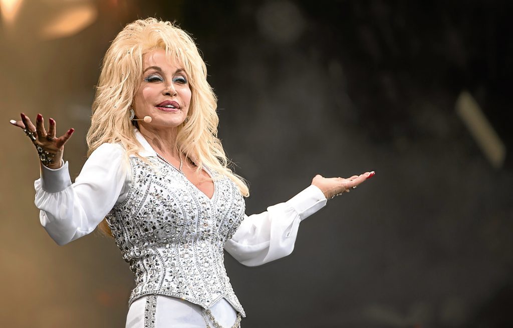 Dolly Parton performs on the Pyramid Stage during Day 3 of the Glastonbury Festival (Photo by Ian Gavan/Getty Images)