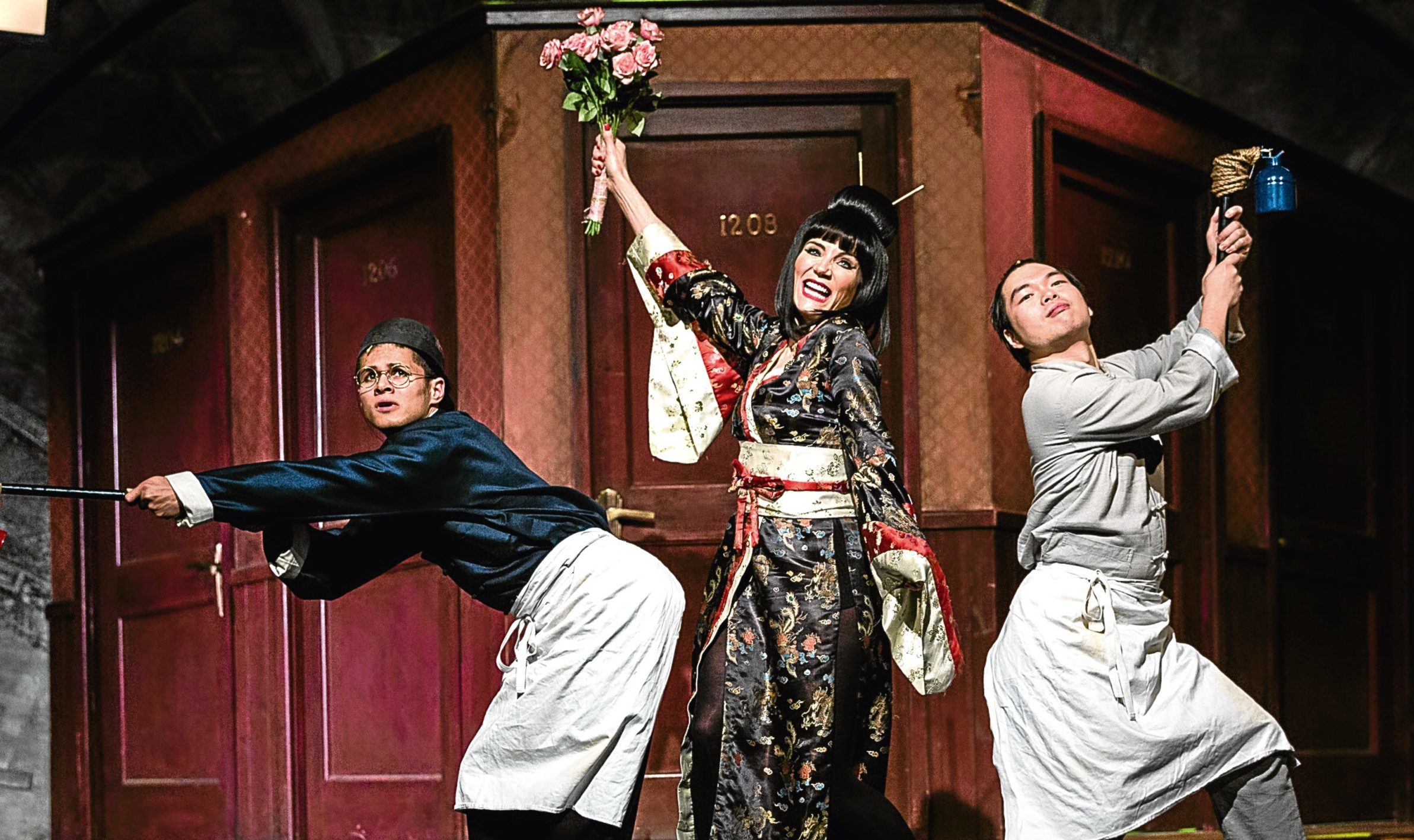 Damian Buhagiar as Ching Ho, Michelle Collins as Mrs Meers and Andy Yau as Bun Foo in Thoroughly Modern Millie (Darren Bell)