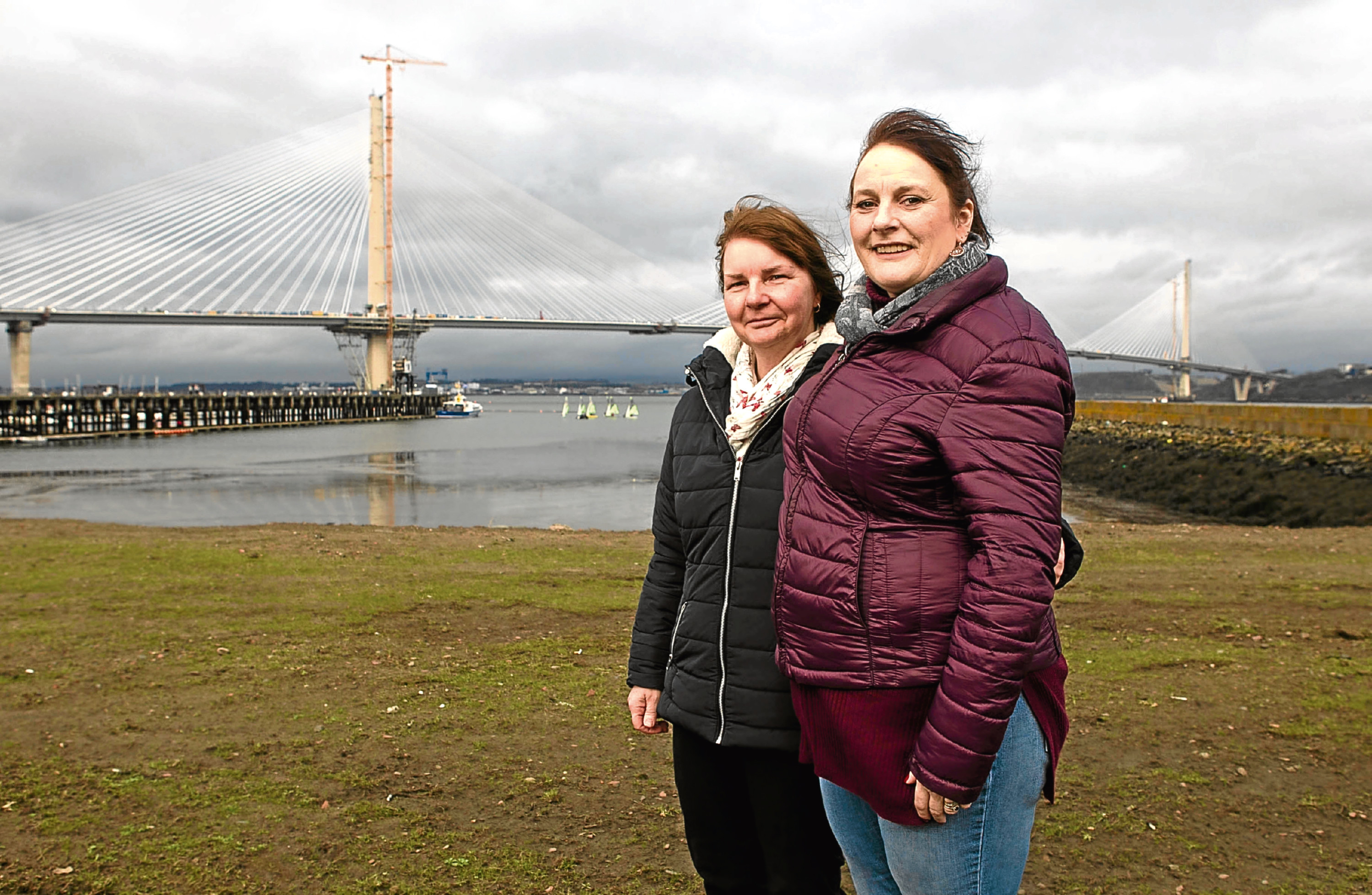 Cousins Jenny (purple jacket) and Heather are looking to recreate what their grandfather did and be the first people to walk across the new Queensferry Crossing