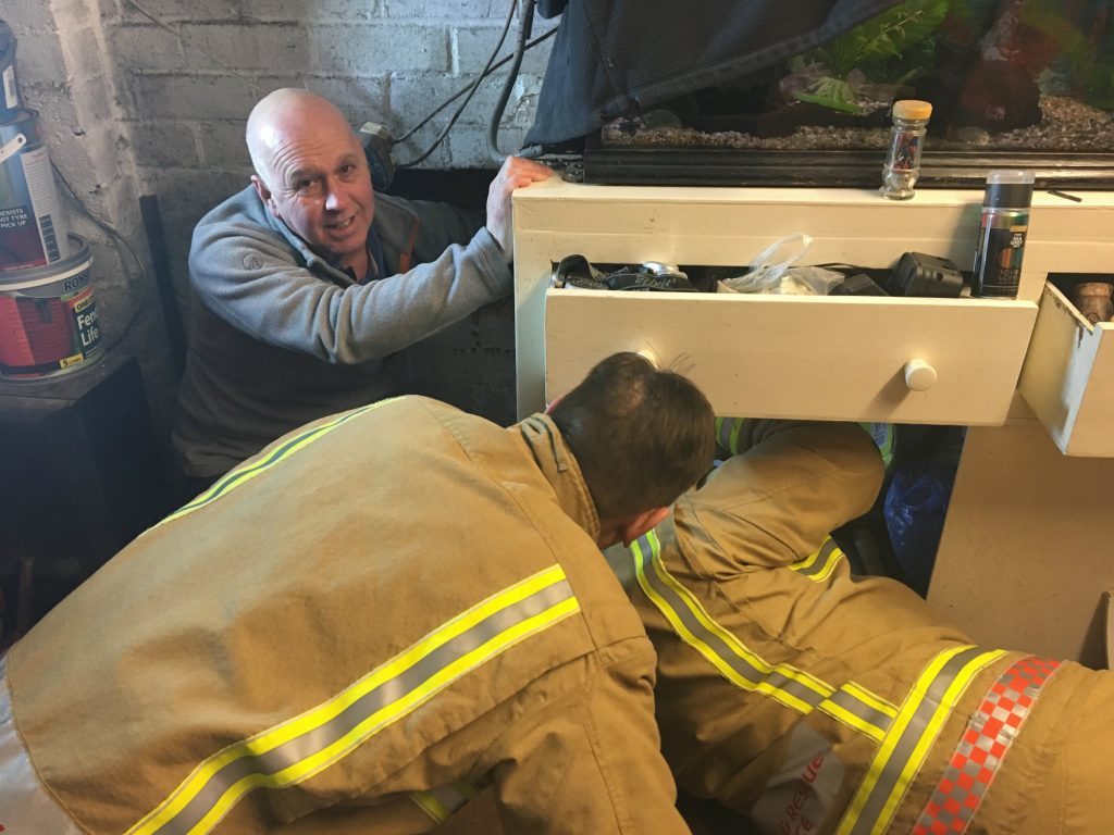 BEST QUALITY AVAILABLE Undated handout photo issued by the RSPCA of emergency services rescuing Mickey the cat, who became wedged in an 8in (20cm) gap between two walls and was freed after a four-hour rescue operation. PRESS ASSOCIATION Photo. Issue date: Tuesday February 7, 2017. Fire crews were forced to cut through a cabinet and use a chisel to cut away bricks before pushing the animal, named Mickey, to safety at a home in Trentham, Stoke-on-Trent. See PA story ANIMALS Wall. Photo credit should read: RSPCA/PA Wire NOTE TO EDITORS: This handout photo may only be used in for editorial reporting purposes for the contemporaneous illustration of events, things or the people in the image or facts mentioned in the caption. Reuse of the picture may require further permission from the copyright holder.