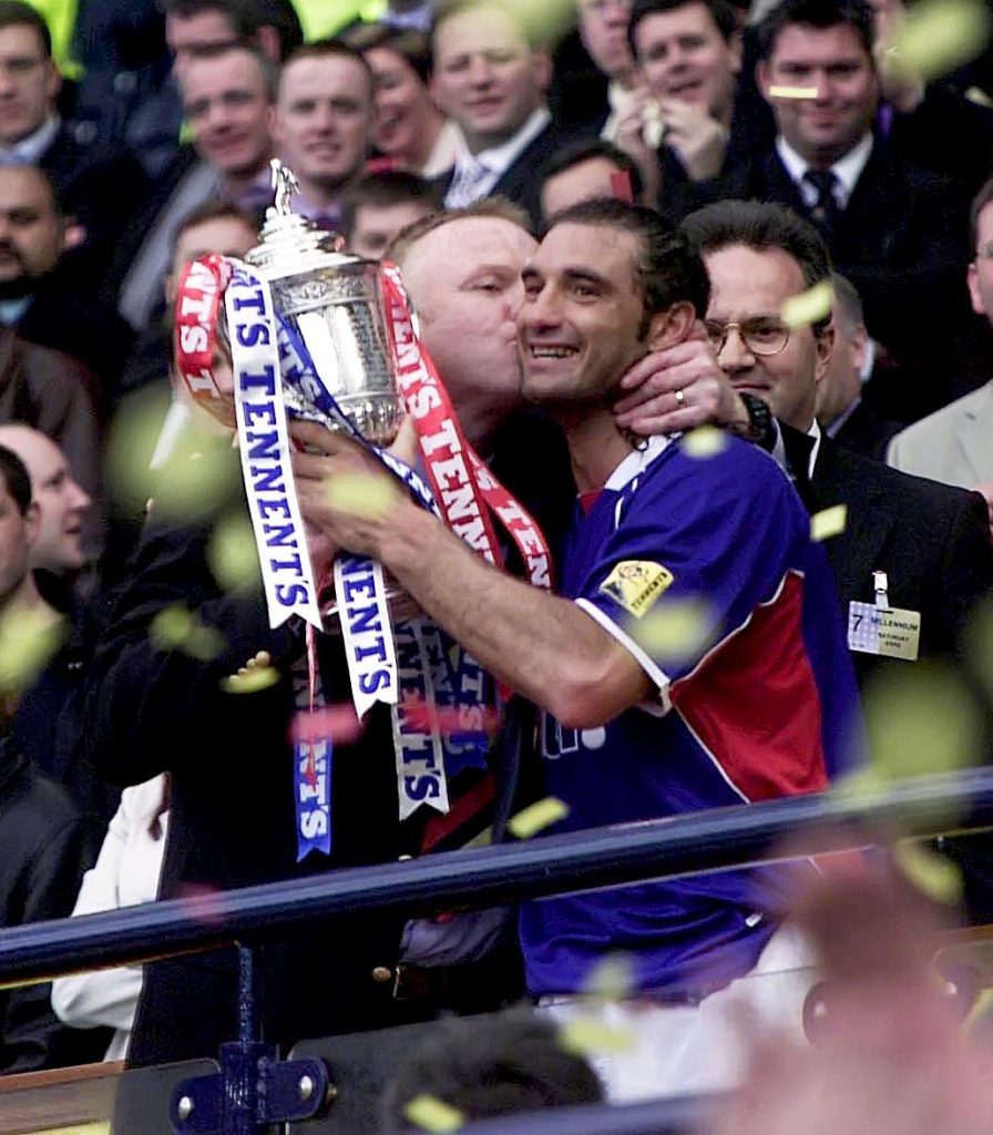A kiss for Lorenzo Amoruso from Rangers boss Alex McLeish (left) after the 2002 Scottish Cup Final (SNS Group)