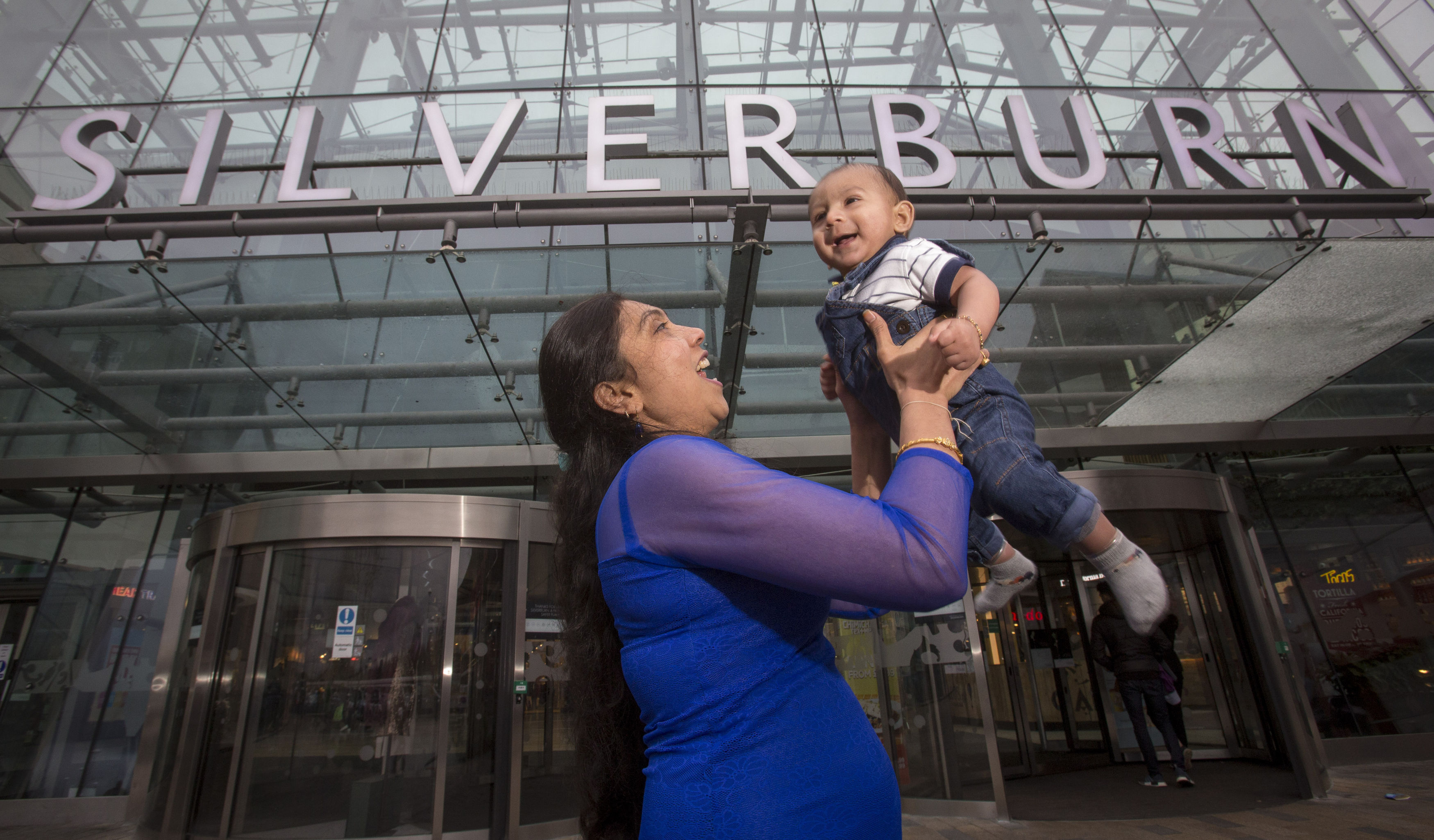 Krishna Barot with her baby Nitul outside Silverburn shopping centre in Glasgow, where he was born after Krishna went into labour unexpectedly (Mark F Gibson/PA Wire)