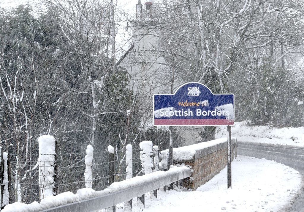 A snow-covered road sign in Carlops near the Scottish Borders, as flights have been cancelled and commuters were warned they faced delays after Storm Doris reached nearly 90mph on its way to batter Britain. PRESS ASSOCIATION Photo. Picture date: Thursday February 23, 2017. See PA story WEATHER Storm. Photo credit should read: Jane Barlow/PA Wire