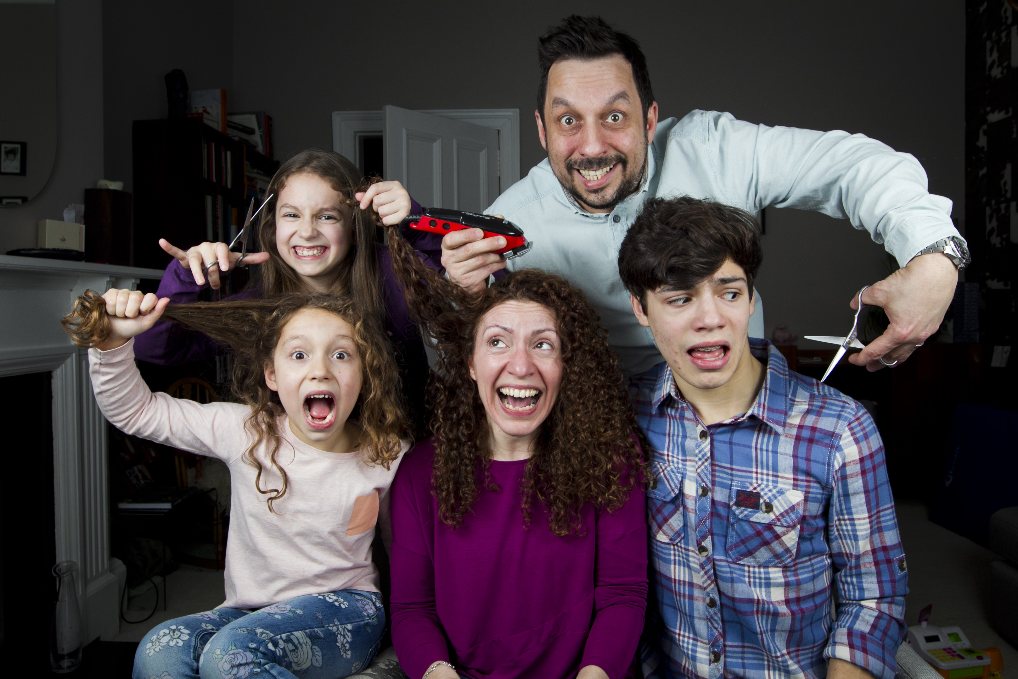 Karen Gilmore and daughters Popi and Skye, son Cian, and hairdresser husband Nick (Andrew Cawley / DC Thomson)