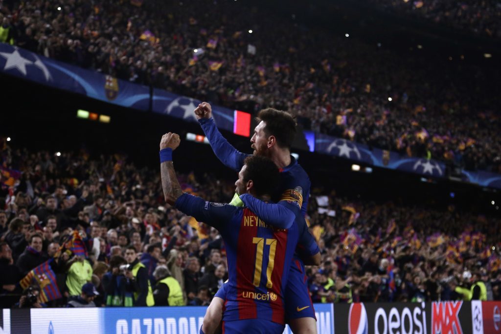 Barcelona's Lionel Messi celebrates with Neymar  (AP Photo/Emilio Morenatti)