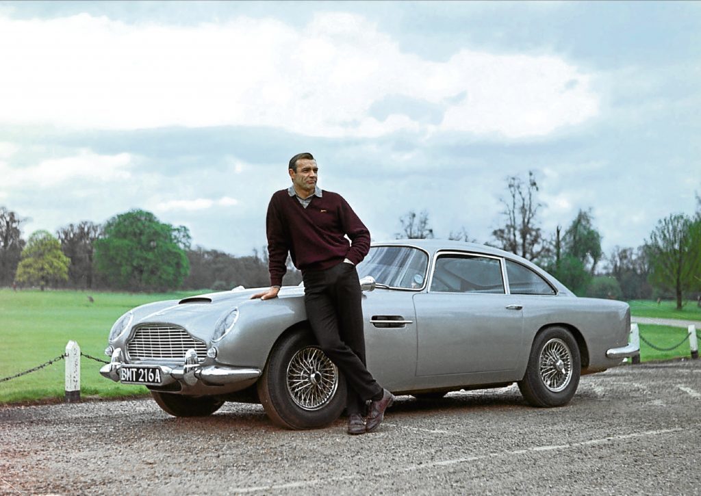 Sean Connery and the famous Aston Martin (Allstar/UNITED ARTISTS) 