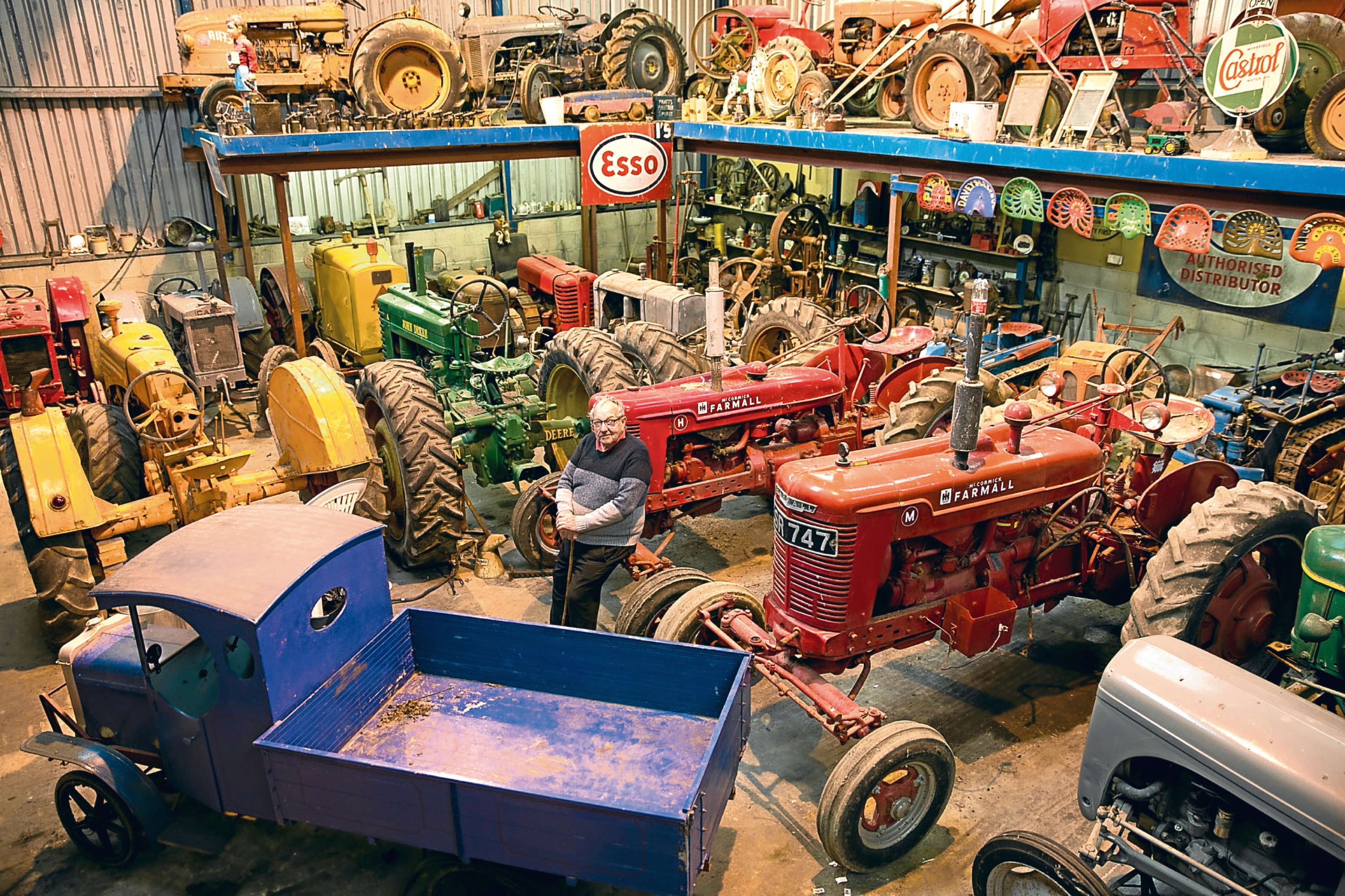 David Reid with his collection of Tractors (Ross Johnston/Newsline Media)