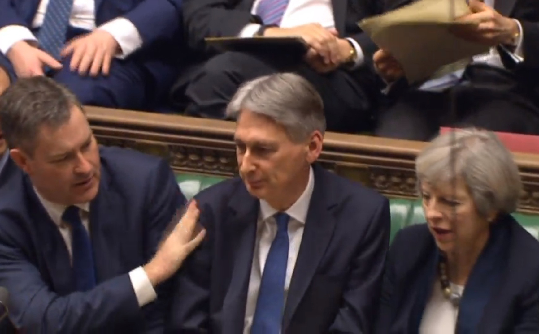 Chief Secretary to the Treasury David Gauke pats Chancellor of the Exchequer Philip Hammond on the shoulder after he made his Budget statement to MPs in the House of Commons. (PA Wire)