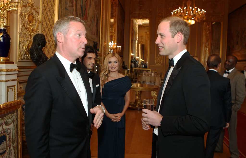 (L-R) Rory Bremner talks to Prince William, Duke of Cambridge during a reception and dinner.(Steve Parsons - WPA Pool/Getty Images)