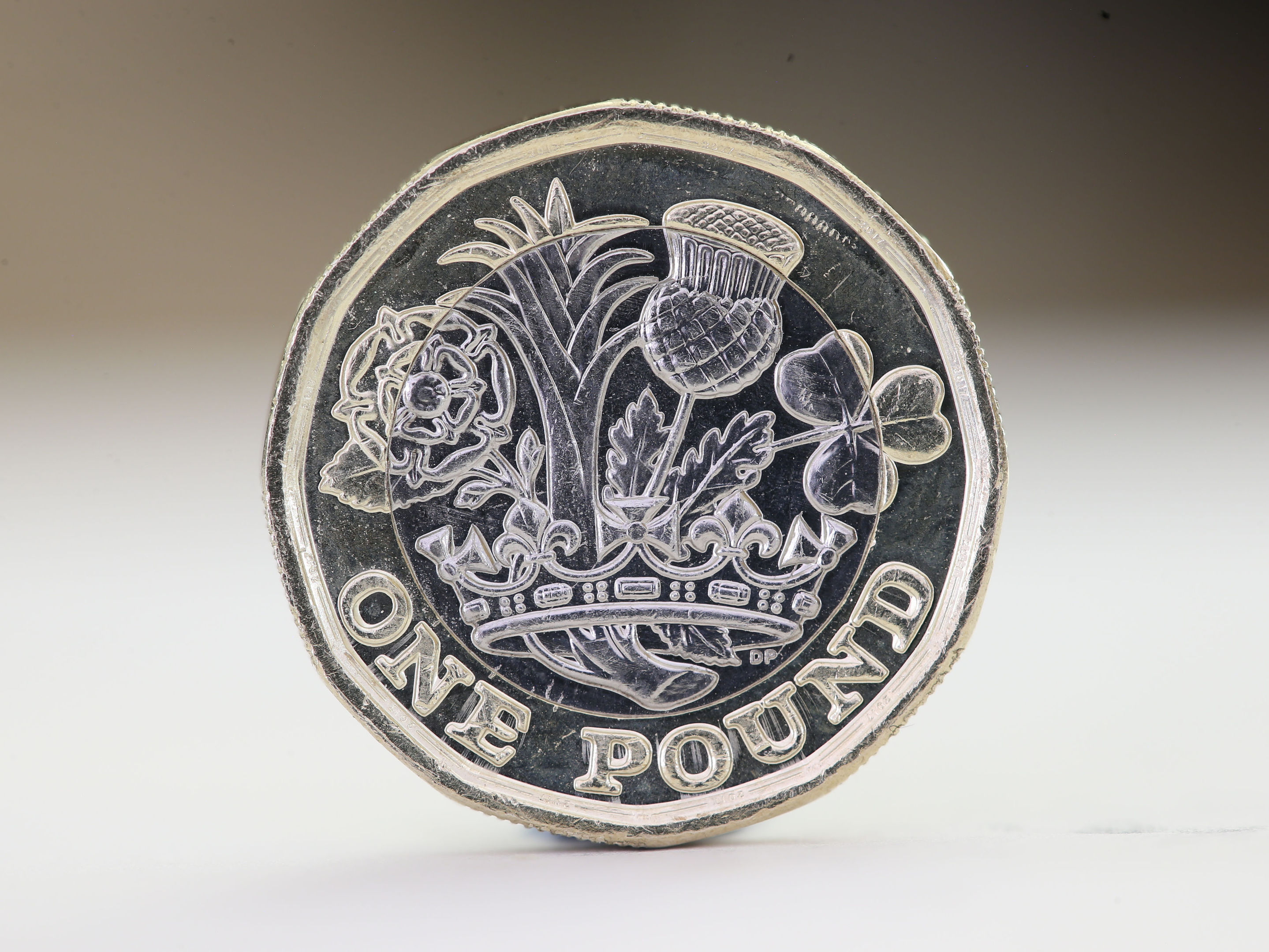 The new 12-sided £1 coin, which will start to enter circulation next week,(Martin Keene/PA Wire)