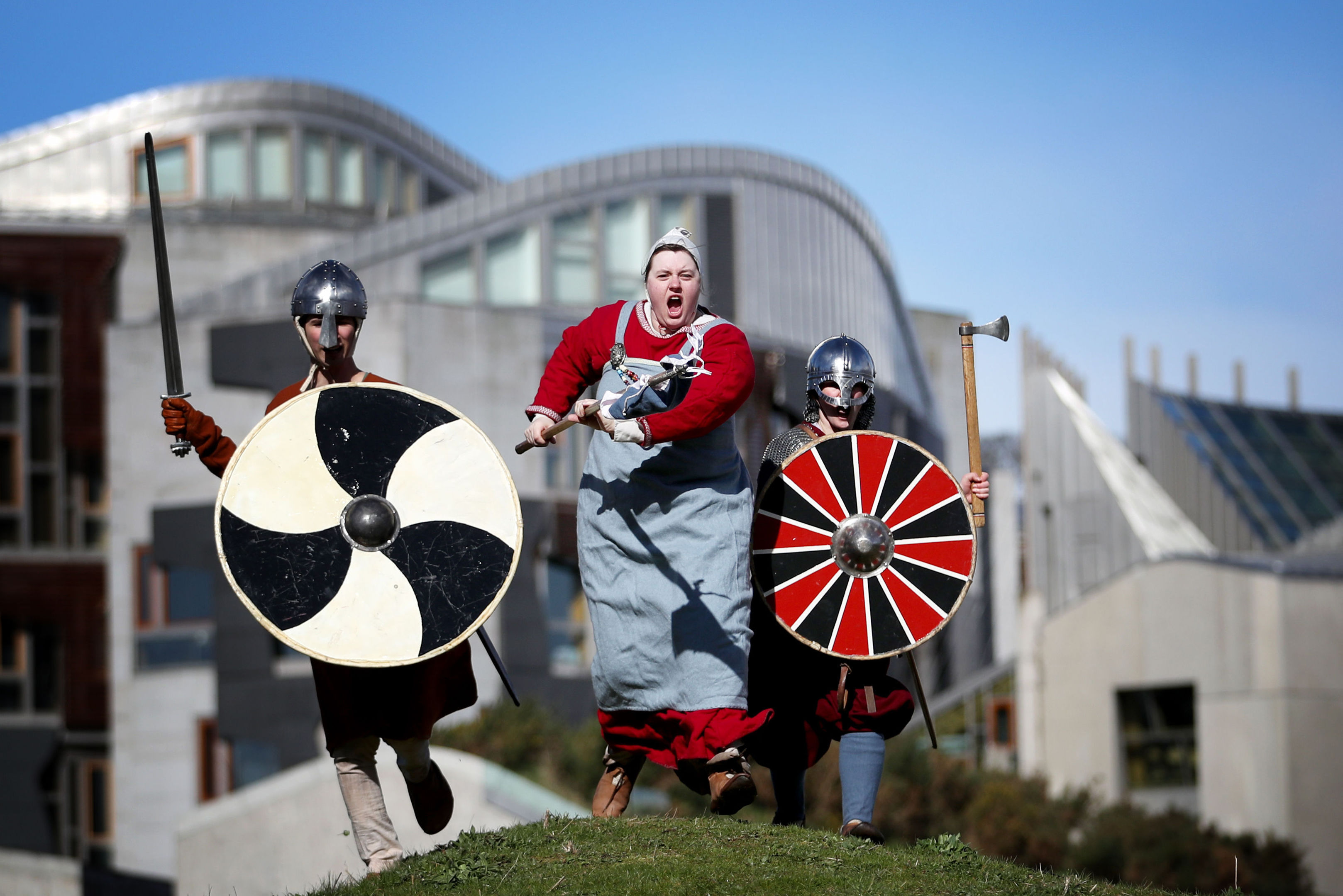 Viking actors (from left) Connor Milton, Jen Cresswell and Louisa Anderson, joined the Galloway Viking Hoard Campaign at the Scottish Parliament in Edinburgh as they hand over a petition calling for the items hidden for 1,000 years in Galloway to be kept in the area rather than moved to the National Museum of Scotland. (Jane Barlow/PA Wire)