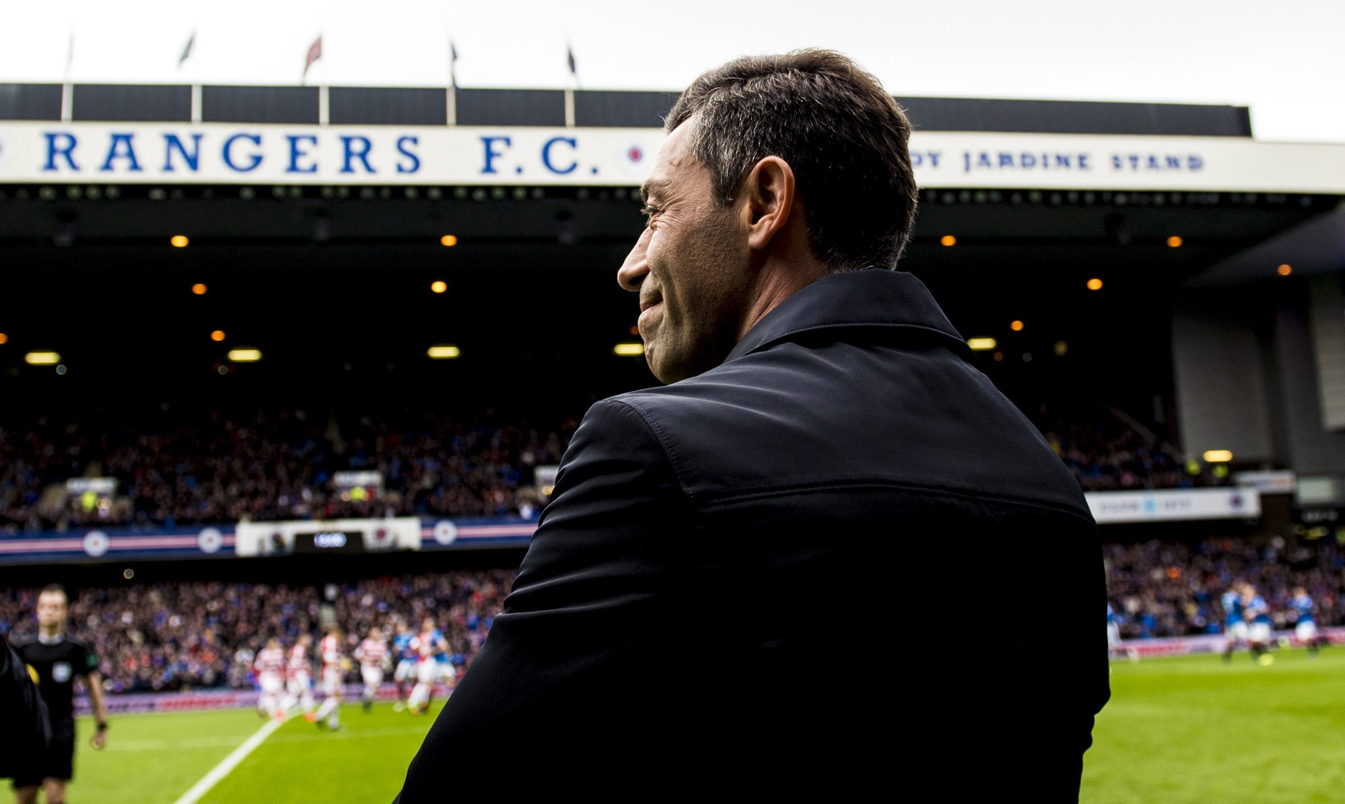 Rangers manager Pedro Caixinha steps onto the park before the match (SNS Group)