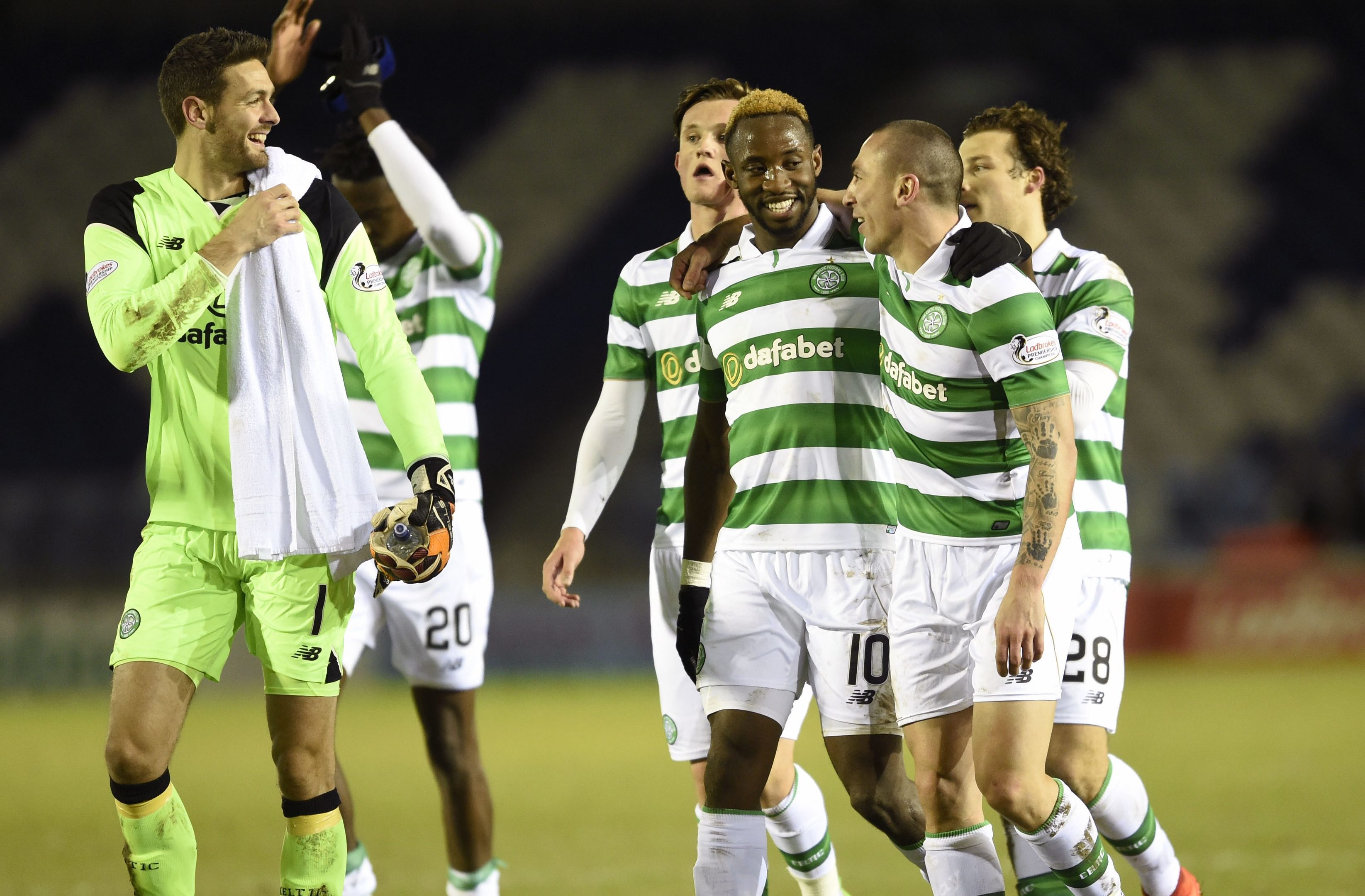 Celtic's Moussa Dembele celebrates victory with Scott Brown and goalkeeper Craig Gordon (Ian Rutherford/PA Wire)