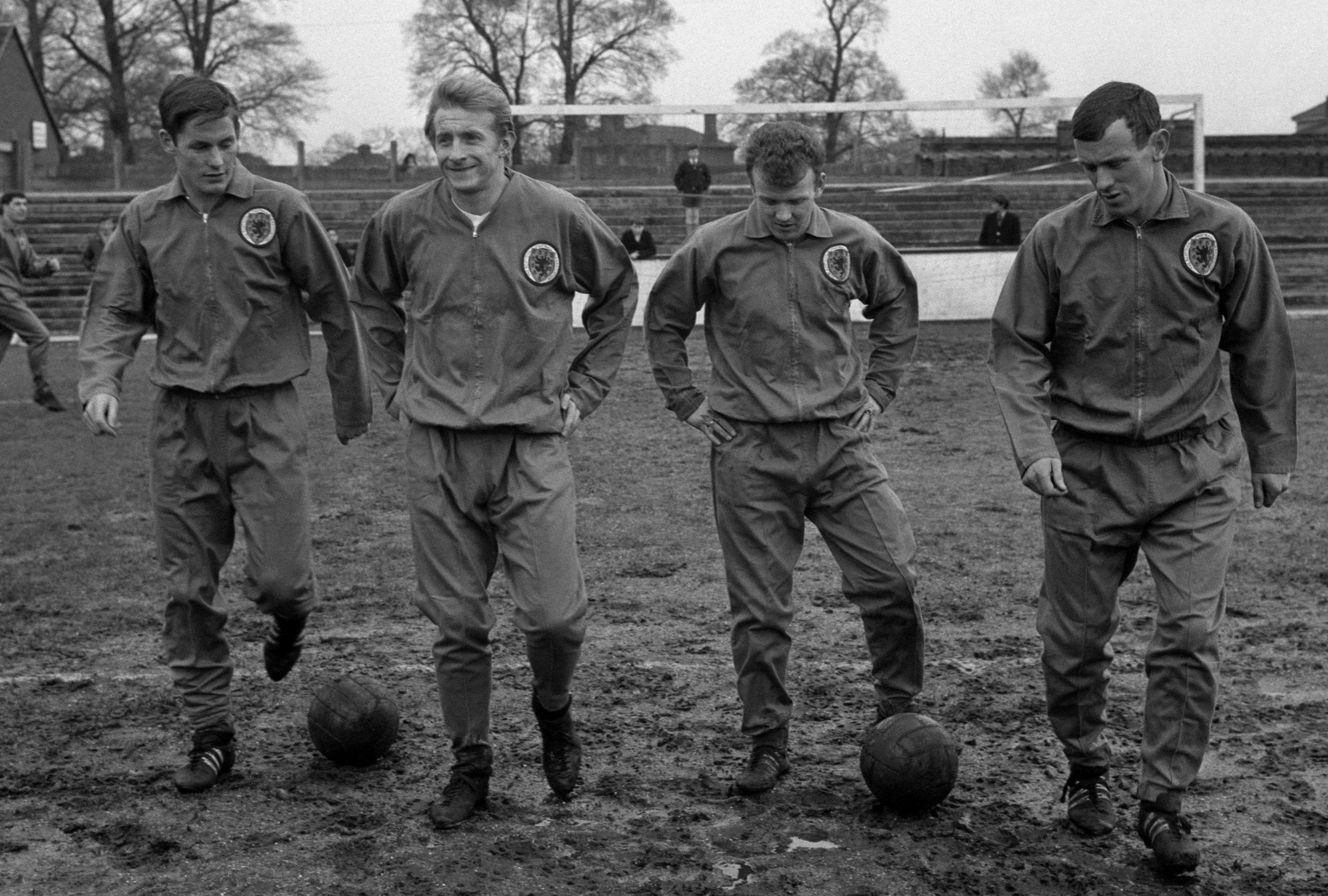 Jim McCalliog, Denis Law, Billy Bremner and Bobby Lennox in training ready for the match against England (PA Wire)