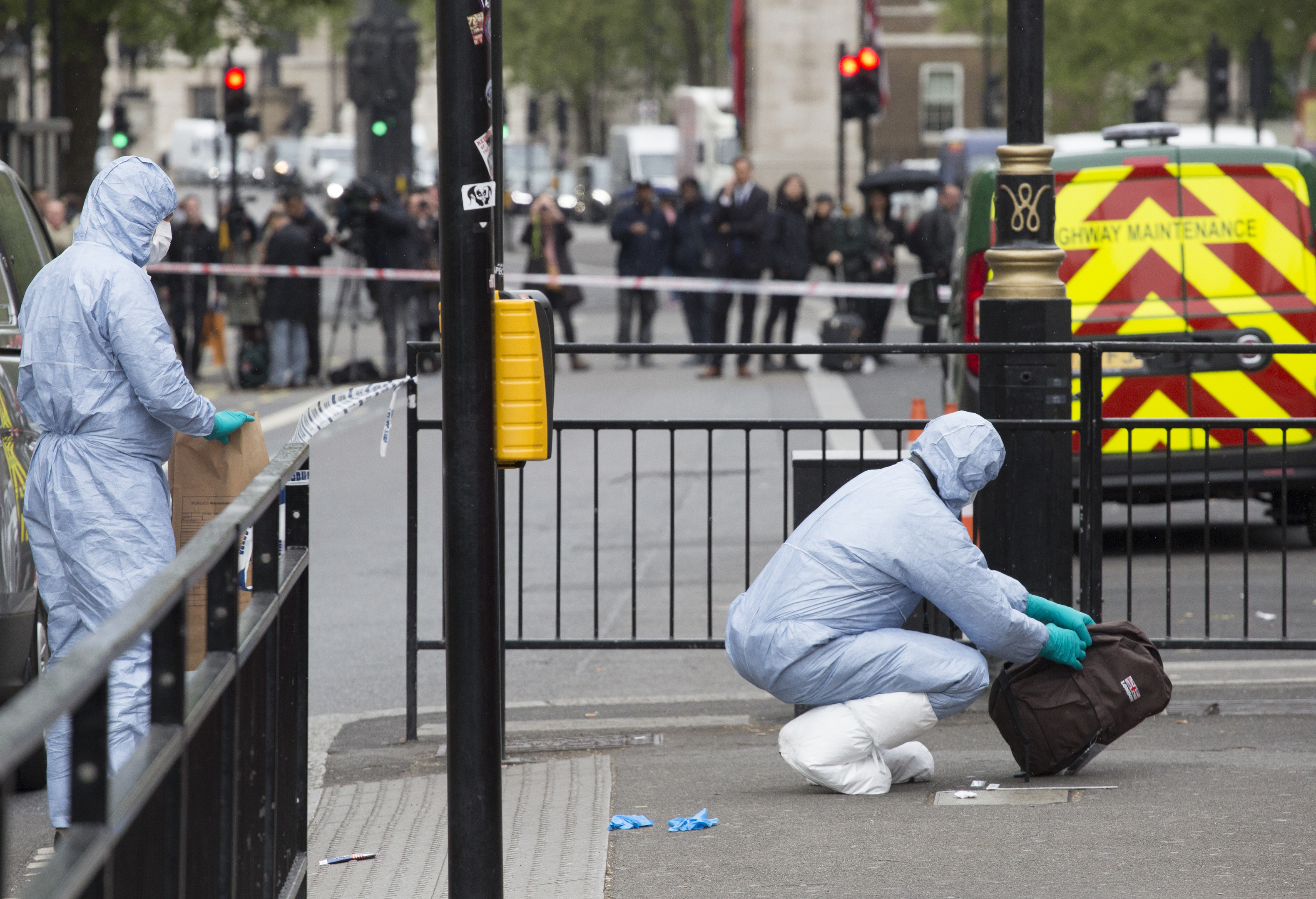 Forensic Officers collect evidence at the scene (John Phillips/Getty Images)