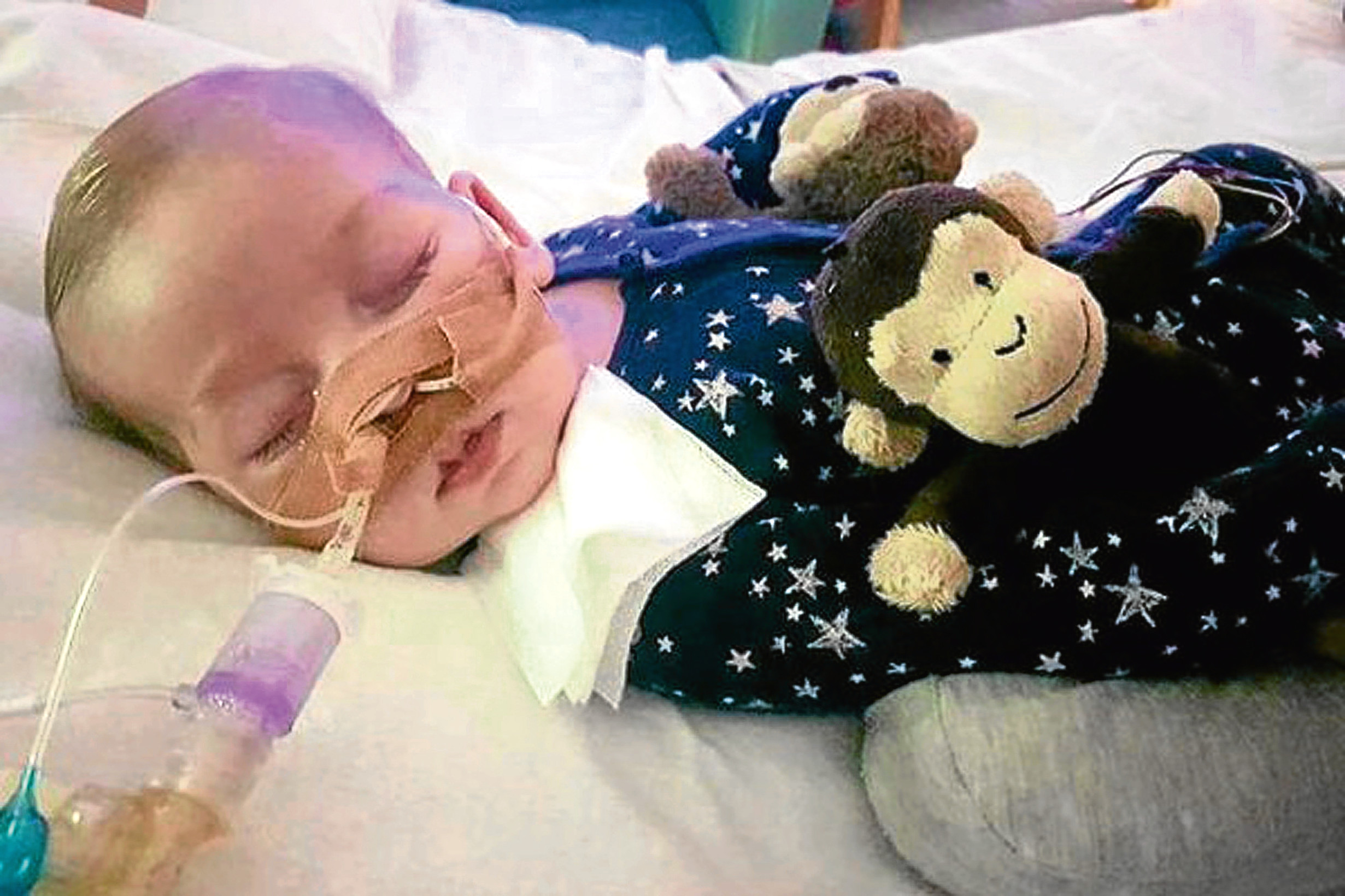 Doctors can withdraw life-support treatment from the baby with a rare genetic condition against his parents' wishes, a High Court judge has ruled. (Family handout/PA Wire)