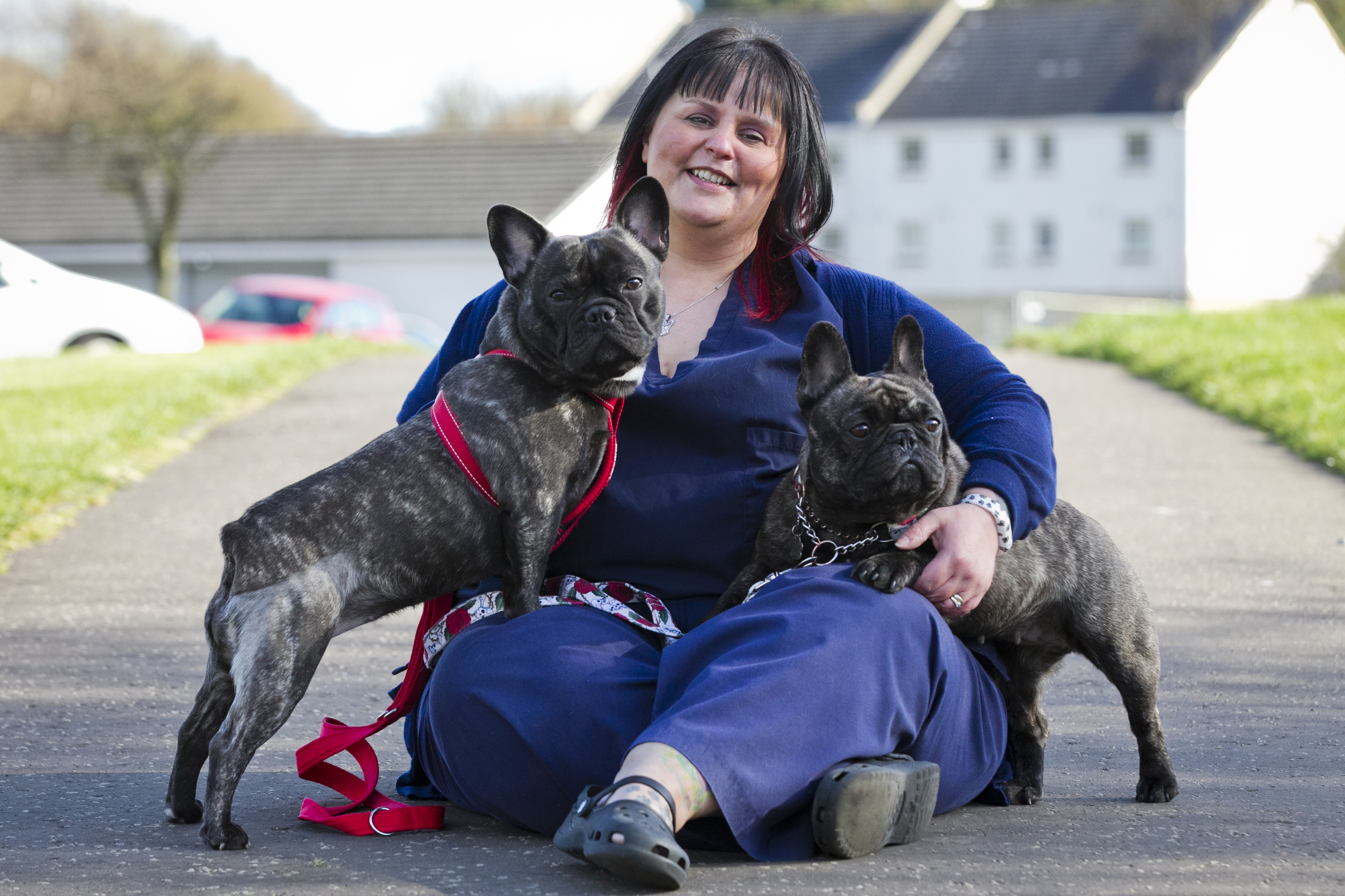 Kathy Ferguson, and her two French Bulldogs, Gabrielle (red lead) and Clarisse (white lead) (Andrew Cawley / DC Thomson)