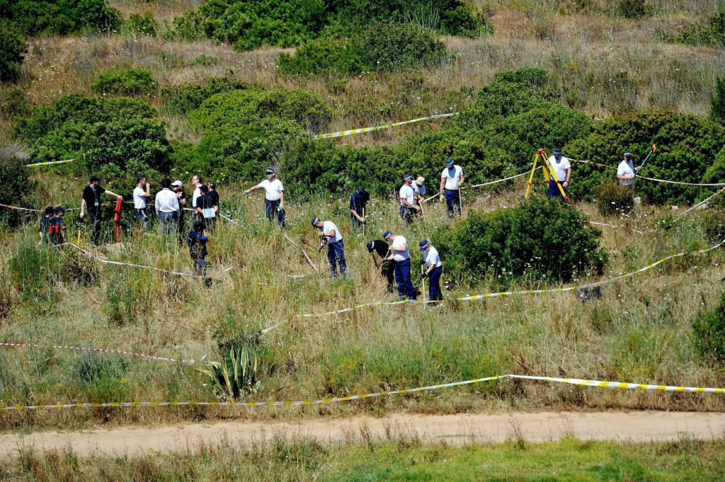 British police and their Portuguese counterparts investigating the disappearance of Madeleine McCann searching a patch of scrubland just outside the town of Praia da Luz in Portugal. (Nick Ansell/PA Wire)