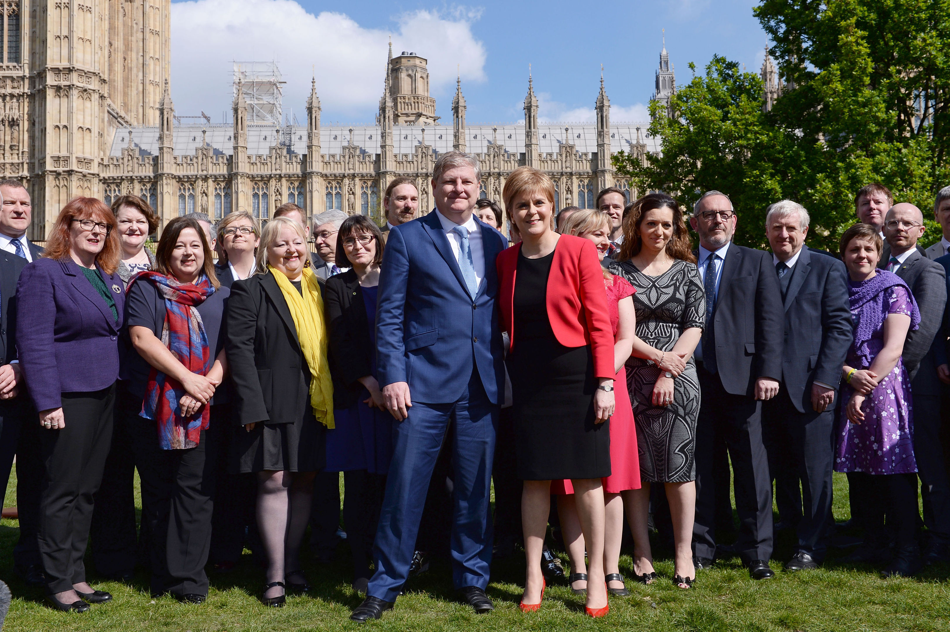 Scotland's First Minister and SNP leader Nicola Sturgeon and the party's Westminster leader Angus Robertson at a photo call with SNP MPs outside the Houses of Parliament in London, following the announcement of a snap general election. (Stefan Rousseau/PA Wire)