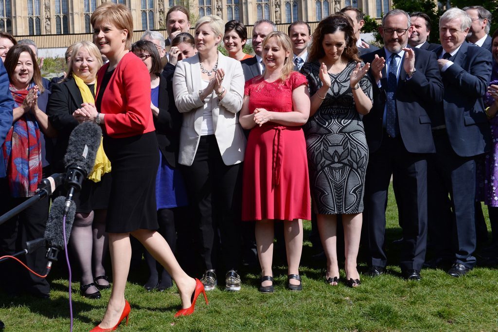Scotland's First Minister and SNP leader Nicola Sturgeon at a photo call with SNP MPs outside the Houses of Parliament in London, following the announcement of a snap general election. PRESS ASSOCIATION Photo. Picture date: Wednesday April 19, 2017. See PA story POLITICS Election SNP. Photo credit should read: Stefan Rousseau/PA Wire