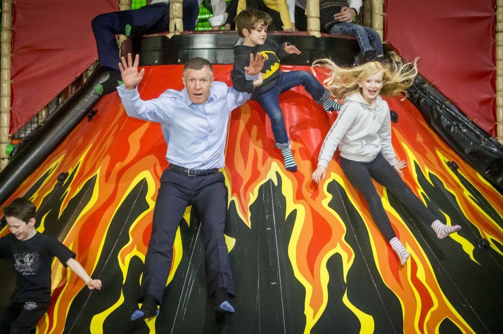 Scottish Liberal Democrat leader Willie Rennie on a slide at Jungle Adventure in Edinburgh (Danny Lawson/PA Wire)